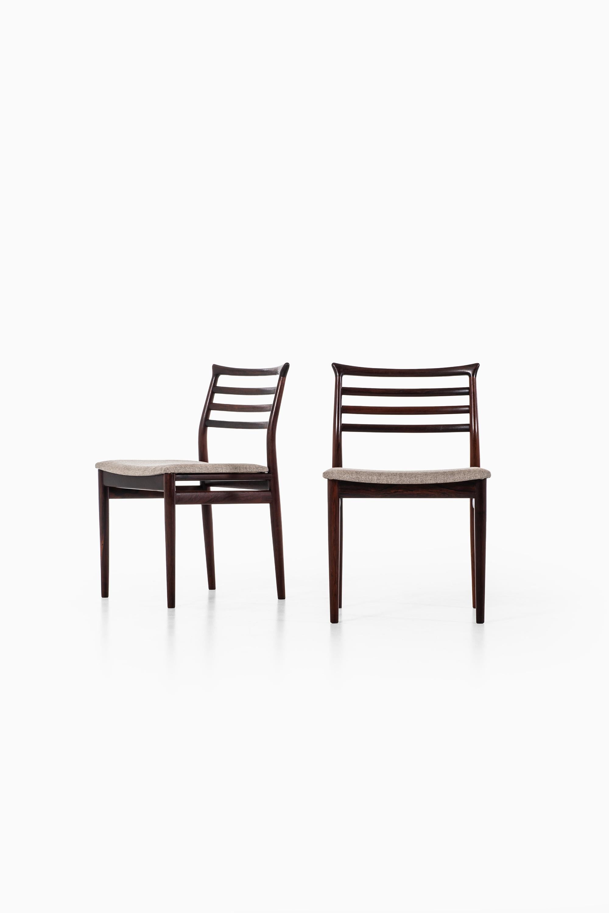 Rare set of 8 dining chairs designed by Erling Torvits. Produced by Sorø stolefabrik in Denmark.
