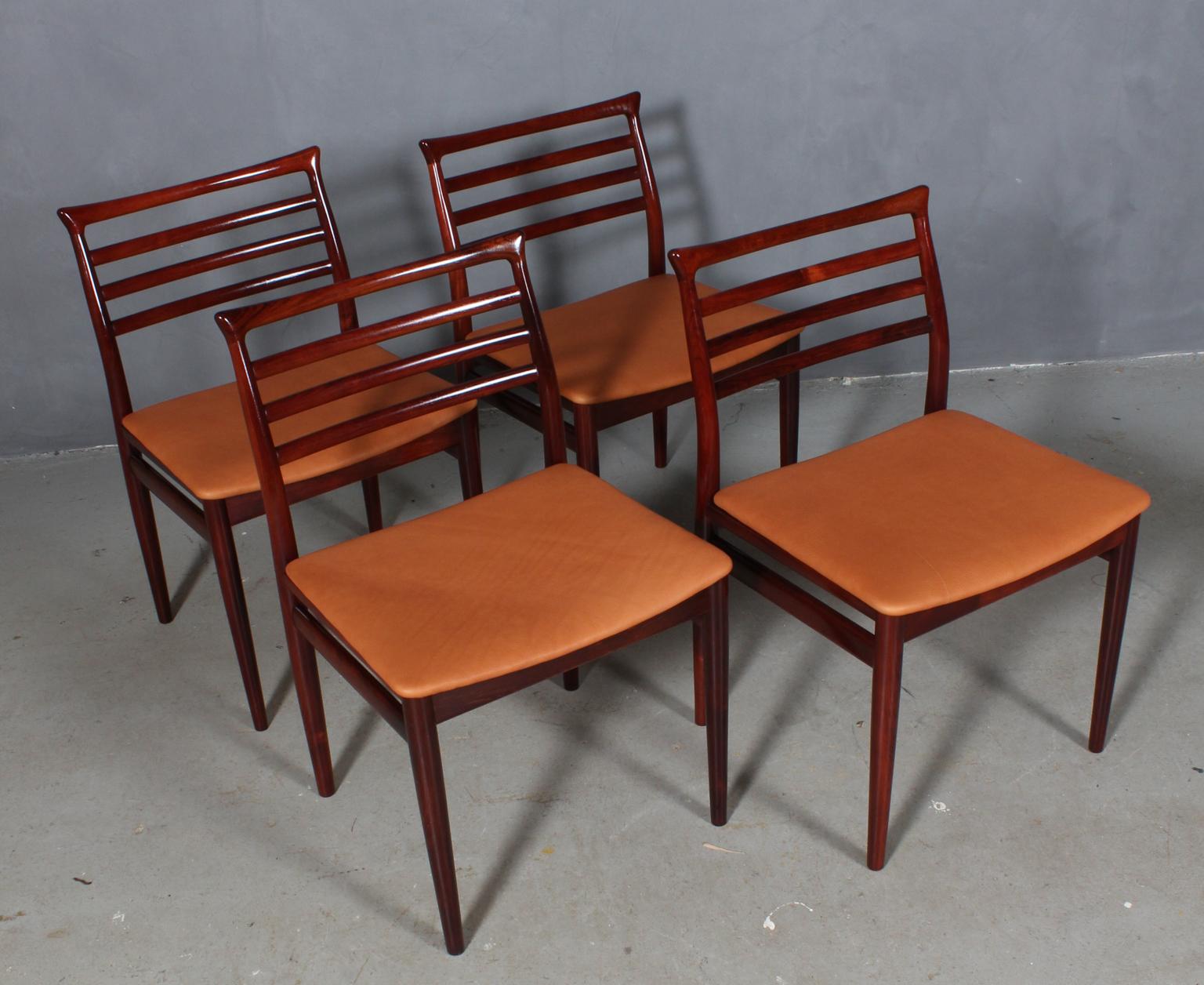 Erling Torvits set of six dining chairs in rosewood. New upholstered with tan aniline leather.

Made by Sorø Stolefabrik.