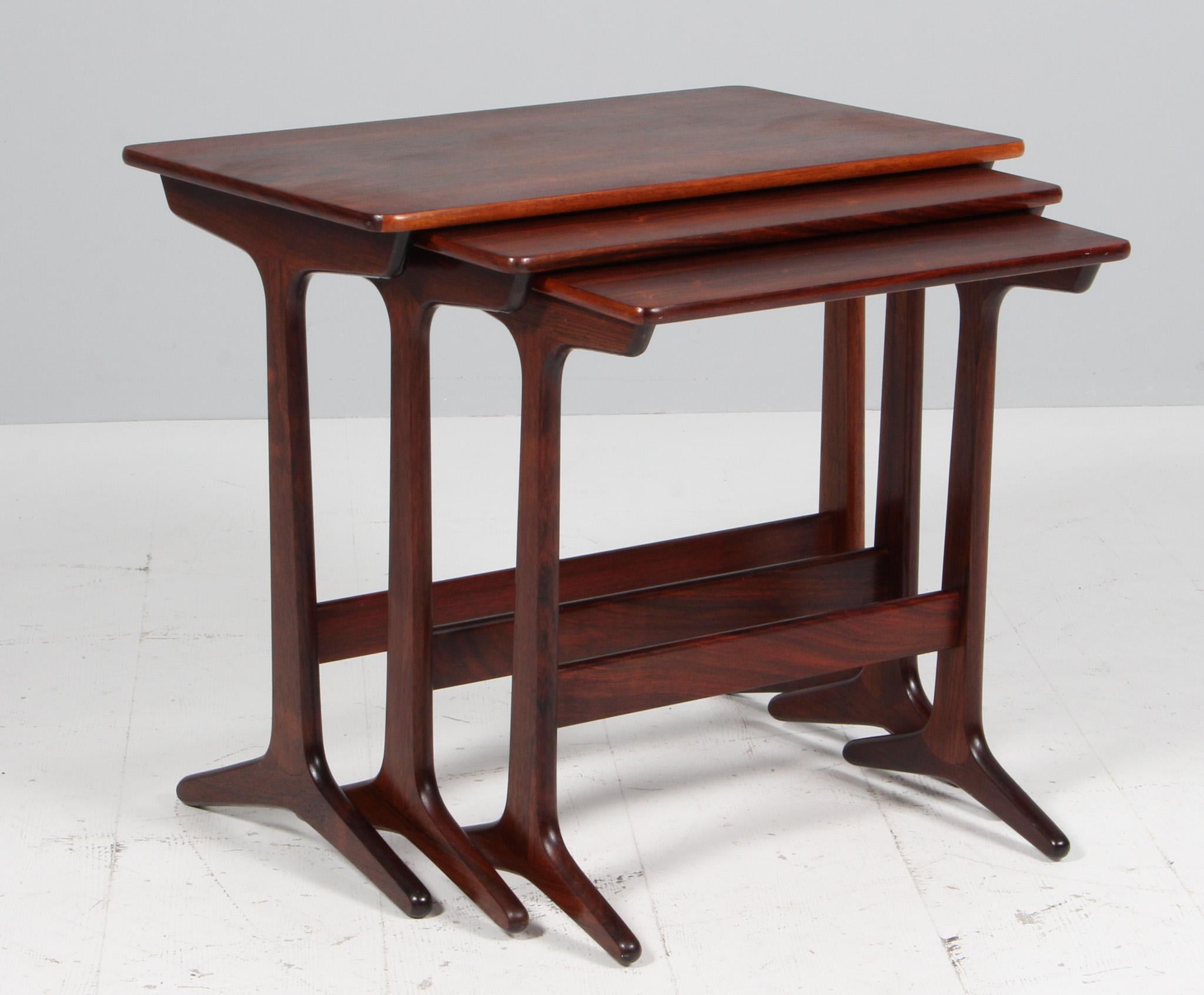 Erling Torvits set of stacking tables in partly solid rosewood.

Made by Heltborg Møbelfabrik.