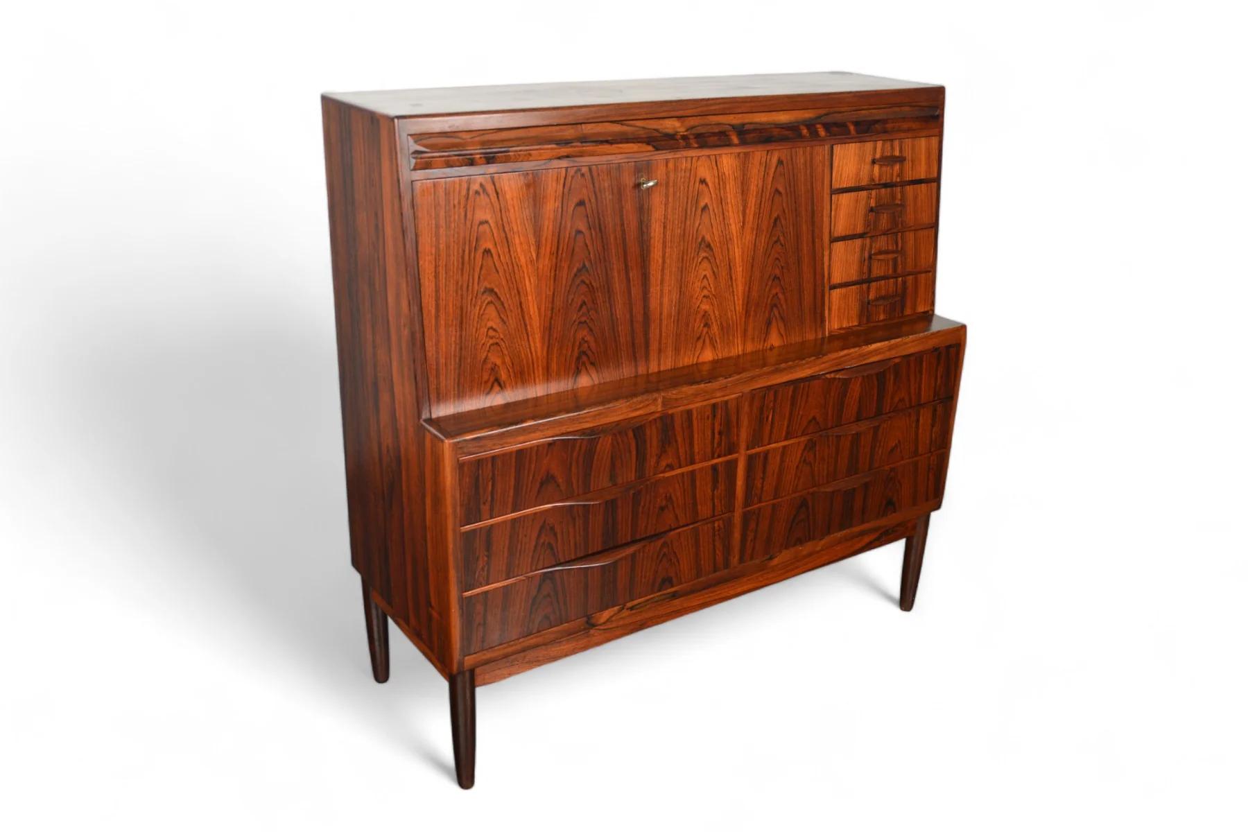 Origin: Denmark
Designer: Erling Torvits
Manufacturer: Klim Møbelfabrik
Era: 1960s
Materials: Rosewood
Measurements: 49.25″ wide x 18.25″ deep x 48″ tall, Desk:34.75