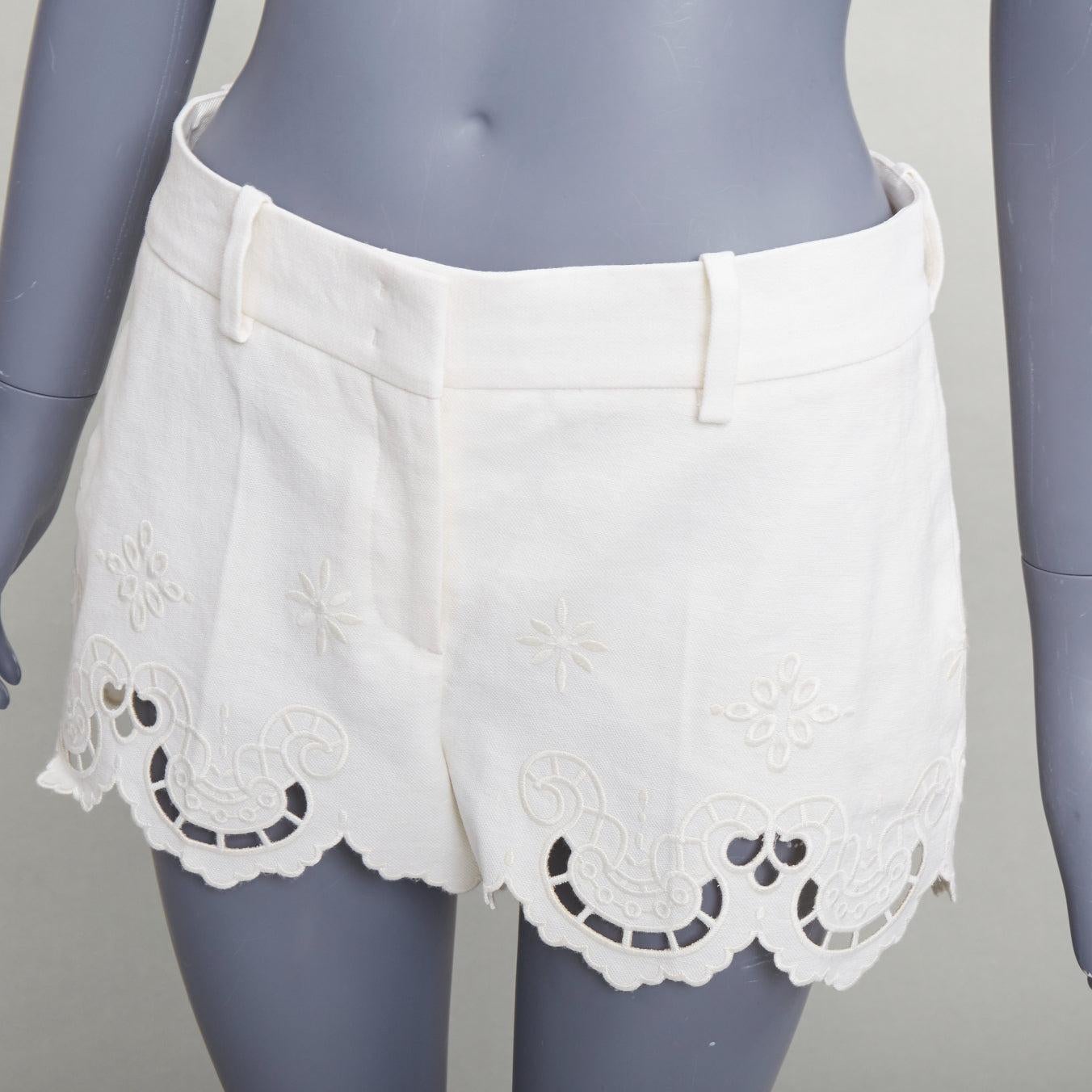 ERMANNO SCERVINO 2020 cream cotton linen Sangallo embroidery scalloped shorts IT38 XS
Reference: AAWC/A01488
Brand: Ermanno Scervino
Collection: 2020
Material: Cotton, Linen
Color: Cream
Pattern: Solid
Closure: Zip Fly
Lining: Cream Fabric
Extra