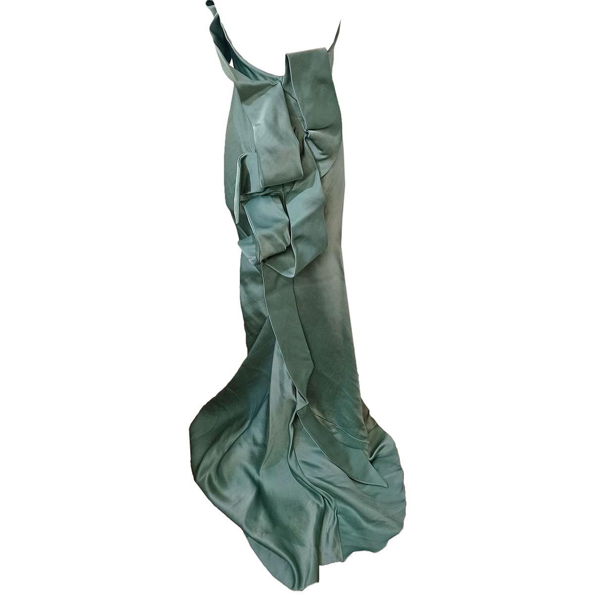 Wonderful long dress by Ermanno Scervino 
Gala dress
Amazing long gala dress
100% Silk
Aqua green color
Beautiful bow (back and front)
Maximum length cm 145 (front) and cm 185 (back) 
Worldwide express shipping included in the price !