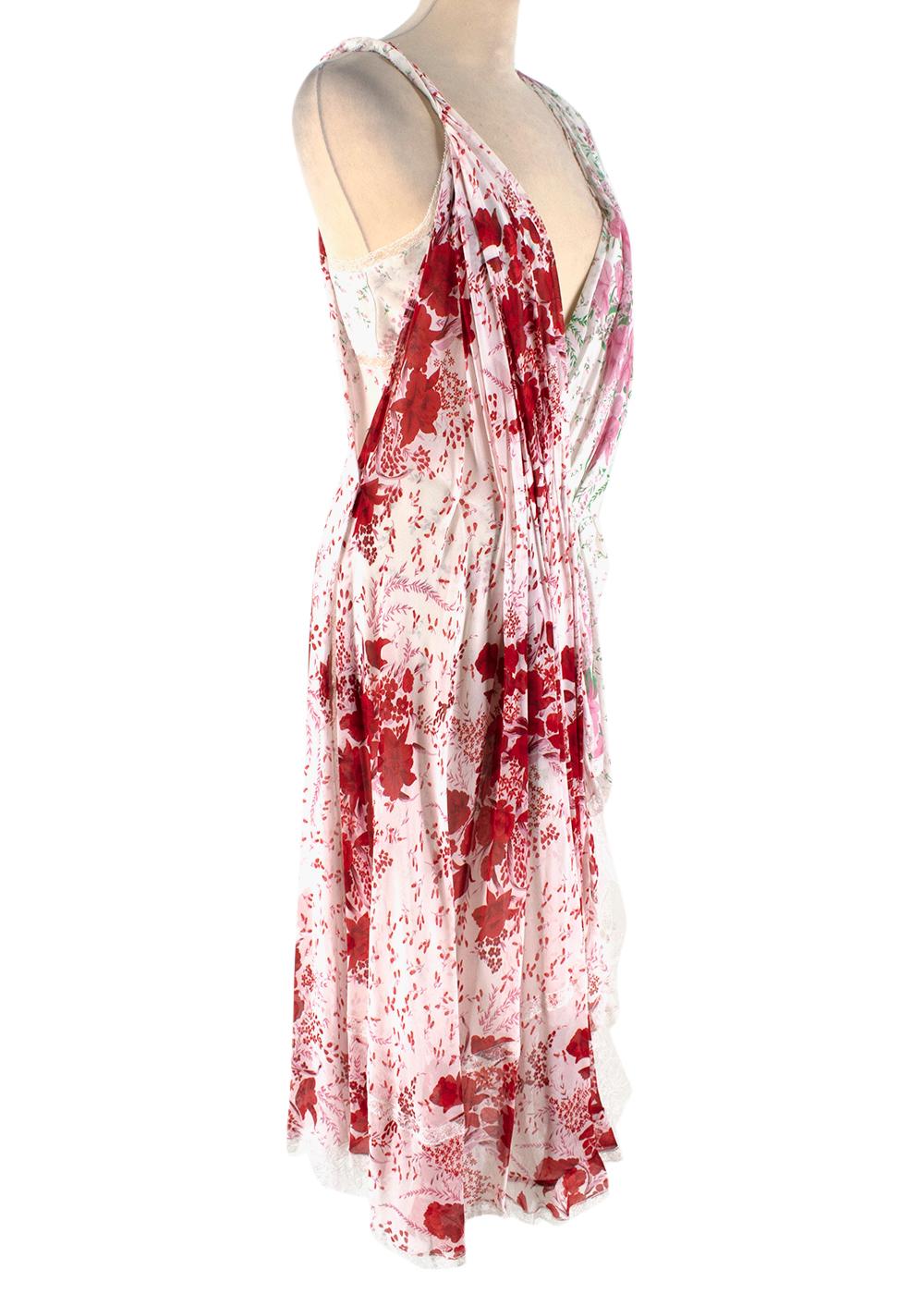 Asymmetric Floral Dress In White

White, pink, green and red silk blend asymmetric floral dress from Ermanno Scervino.

Dry Clean Only

Made In Italy 

Measurements are taken with the item lying flat, seam to seam.
Length - 120cm
Chest - 38cm
