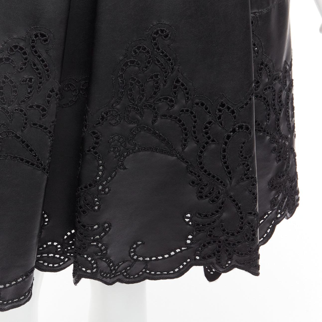 ERMANNO SCERVINO black faux leather lattice embroidery scalloped skirt IT38 XS
Reference: AAWC/A00583
Brand: Ermanno Scervino
Material: Polyamide
Color: Black
Pattern: Solid
Closure: Zip
Lining: Black Polyester
Extra Details: Pleated skirt. Zip back