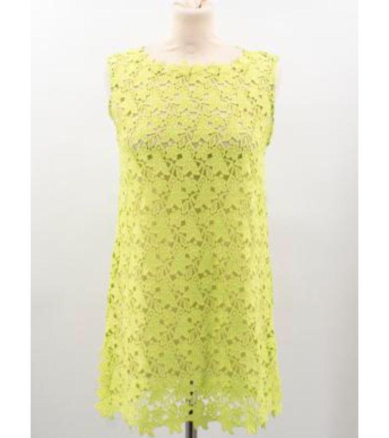 Ermanno Scervino green crochet dress

- Neon Floral Crochet
- Split side detailing
- Handmade

Condition 9.5/10

Please note, these items are preowned and may show signs of being stored even when unworn and unused. This is reflected within the