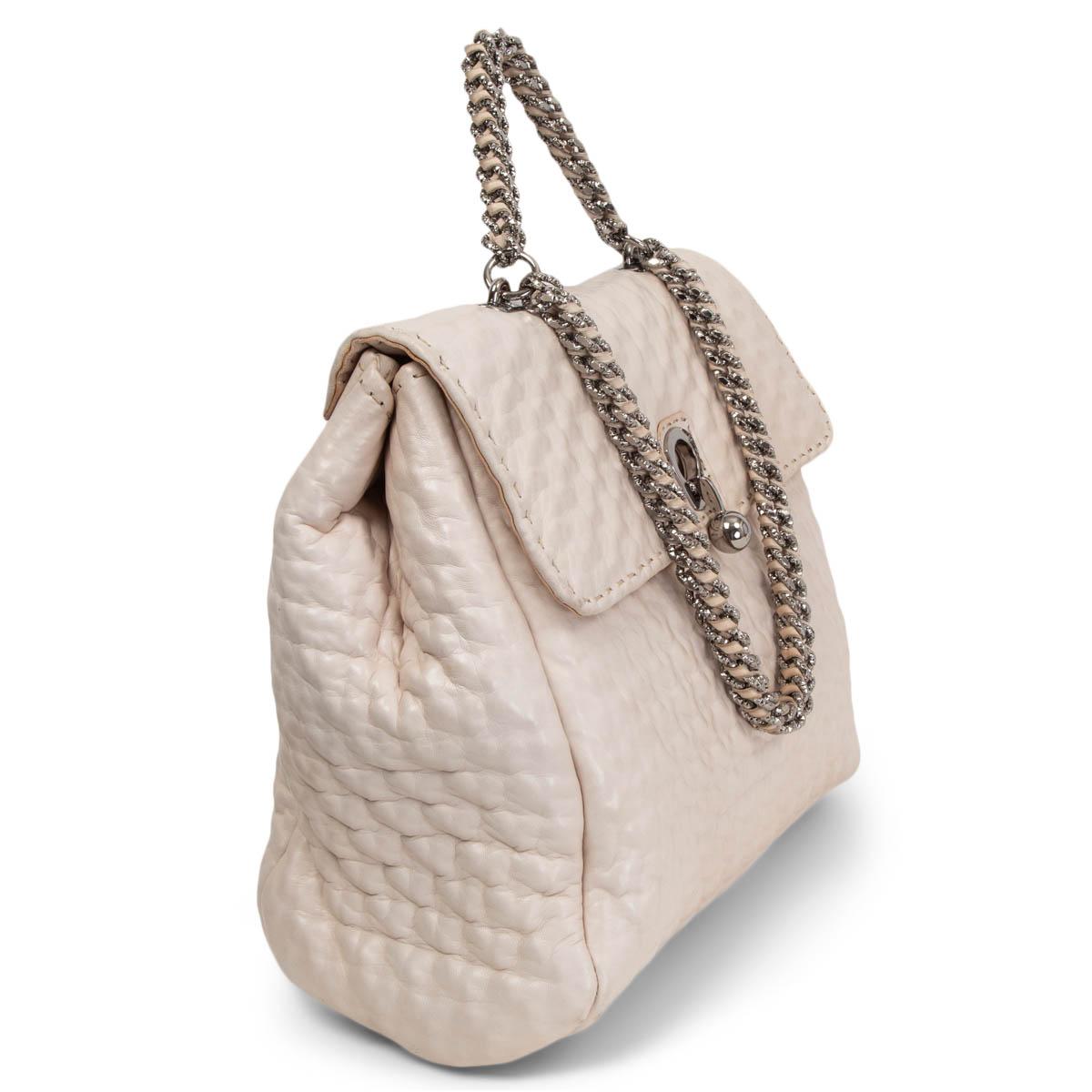 100% authentic Ermanno Scervino Faubourg Large Shoulder Bag in smooth ivory nappa leather and silver-tone metal chain weaved with leather handle and strap. Opens with a flap to a specious interior lined in black knitted wool with one big zipper
