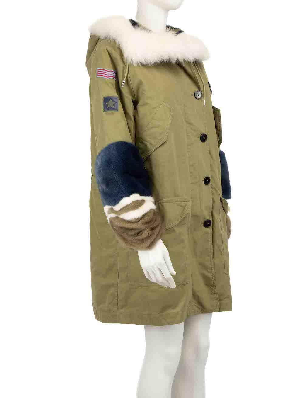 CONDITION is Very good. Minor wear to coat is evident. Light wear to right side chest and left sleeve patches, with a small mark to the right side lower pocket on this used Ermanno Scervino designer resale item.
 
Details
Khaki
Cotton
Parka coat
Fox