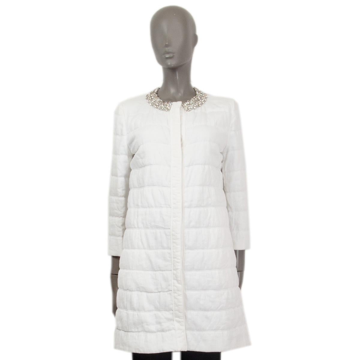 100% authentic Ermanno Scervino quilted crystal embellished collar coat in white linen (100%). Closes with four snap buttons on the front and has slit pockets on the side. Lined in white polyester (100%). Brand new with tag.

Measurements
Tag