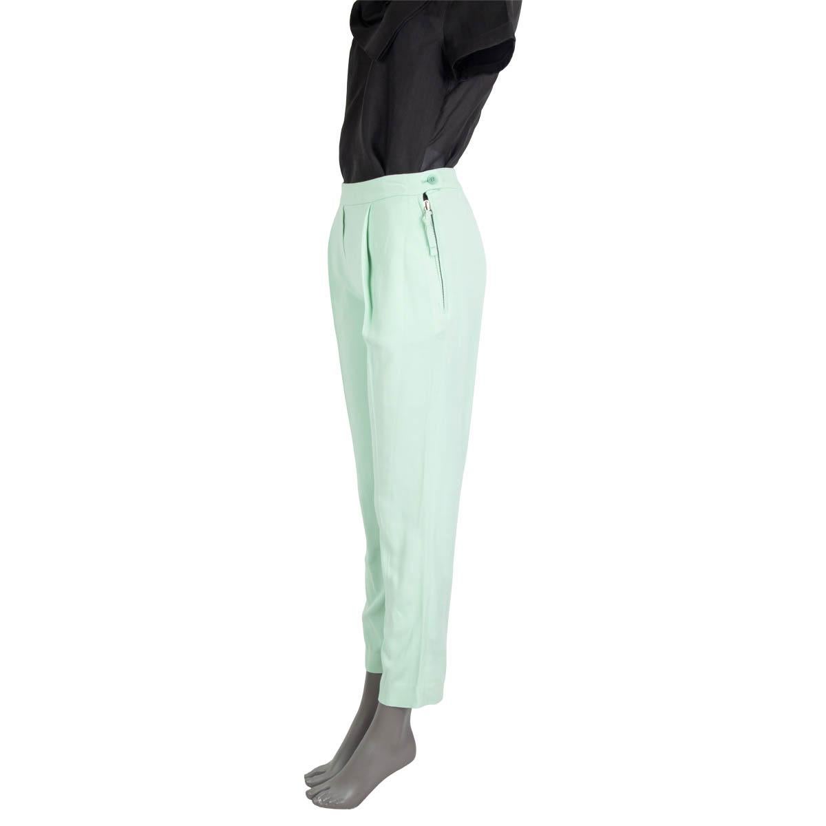 100% authentic Ermanno Scervino pleated pants in mint viscose (97%) and elastane (3%). Opens with a concealed zipper and a button on the side. Unlined. Have benn worn and are in excellent condition.

Measurements
Tag Size	40
Size	S
Waist	72cm