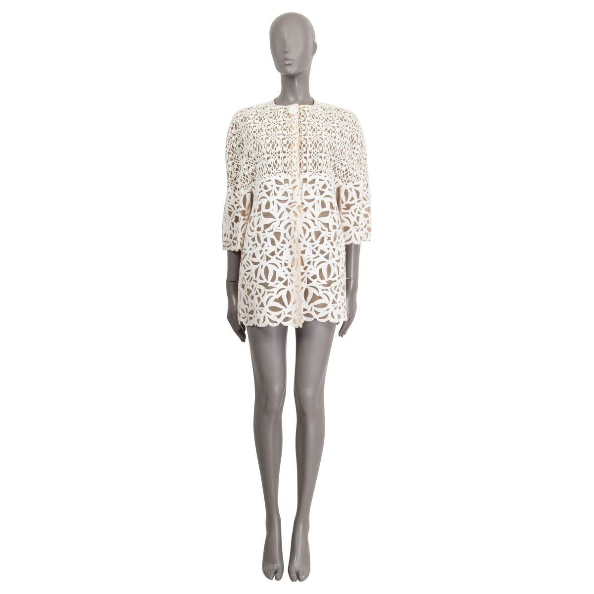 100% authentic Ermanno Scervino crochet jacket in off-white nylon (100%). Comes with 3/4 raglan sleeves (measurements taken from the neck). The attachable mink fur for the collar is missing. Opens with four push buttons on the front. Unlined. Has