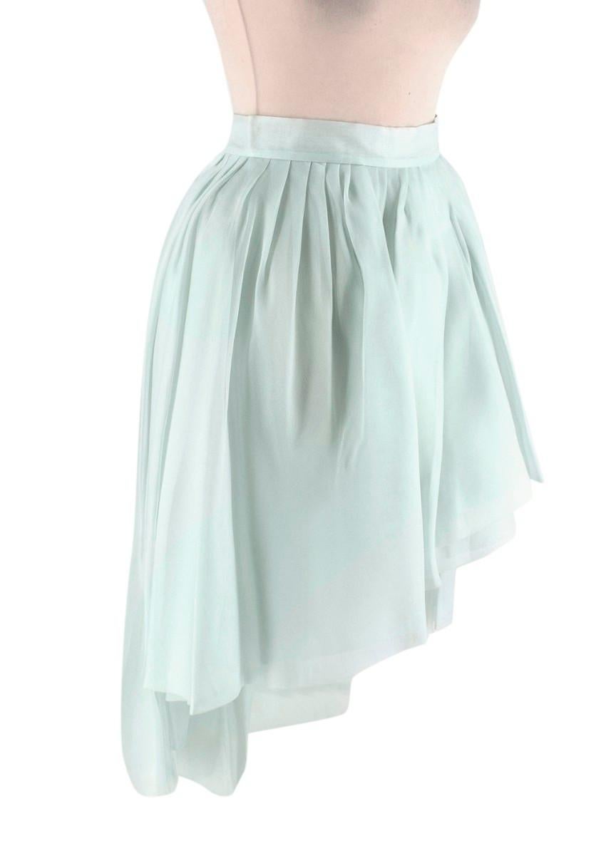Ermanno Scervino Pastel Green Silk Tulle Asymmetric Ball Skirt
 

 - Modern riff on the traditional ball skirt, fine pale green tulle is cut in an asymmetic, multi layered silhouette for a stand-out party look
 - Thick fitted waistband with layers
