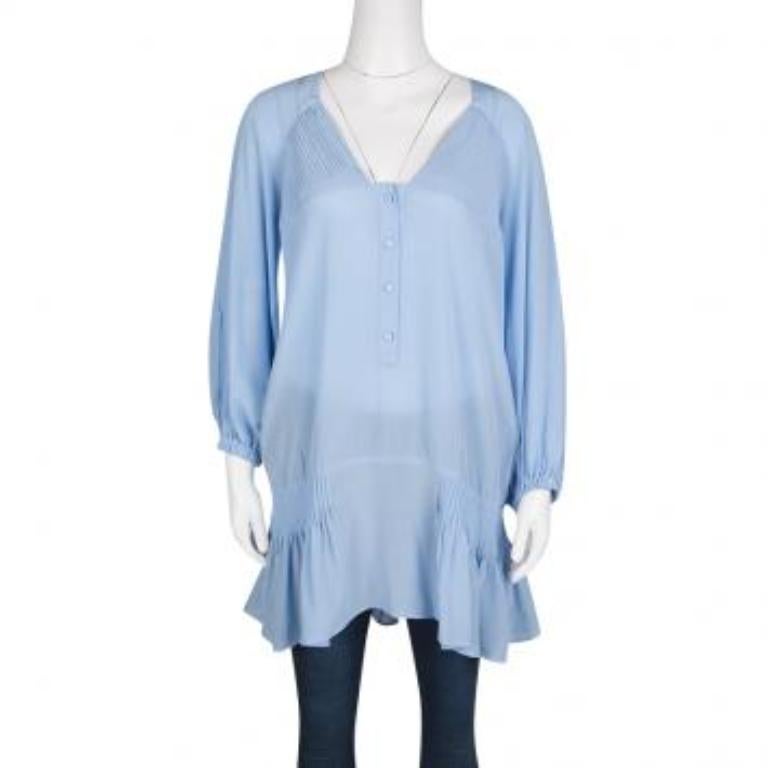 Diese Tunika des italienischen Modehauses Ermanno Scervino hat eine lockere Passform und ist ein bezauberndes Stück für den Tag. Diese Tunika aus Seide ist mit Biesen, einem geknöpften Ausschnitt und elastischen Bündchen versehen. Kombinieren Sie es