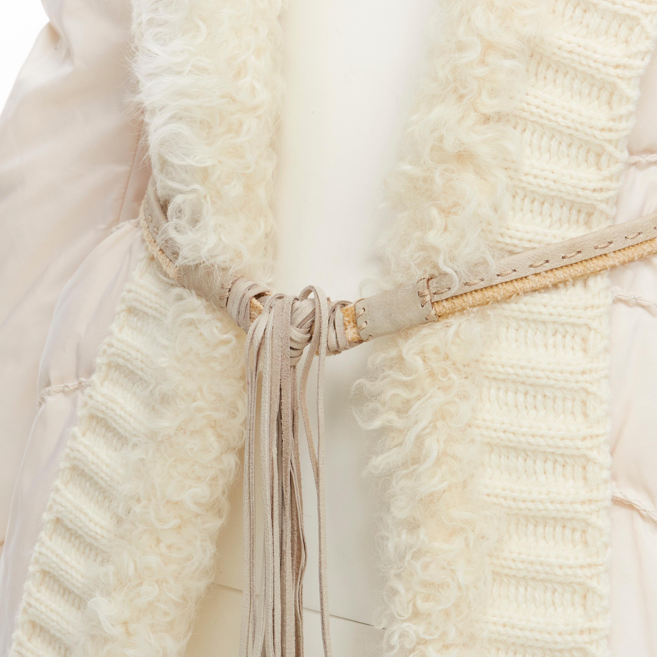 ERMANNO SCERVINO white shearling knit collar belted down puffer coat IT38 XS 
Reference: CELG/A00147 
Brand: Ermanno Scervino 
Material: Nylon Color: 
White Pattern: Solid
Closure: Hook & Eye 
Extra Detail: Shearling collar and wool knit collar.