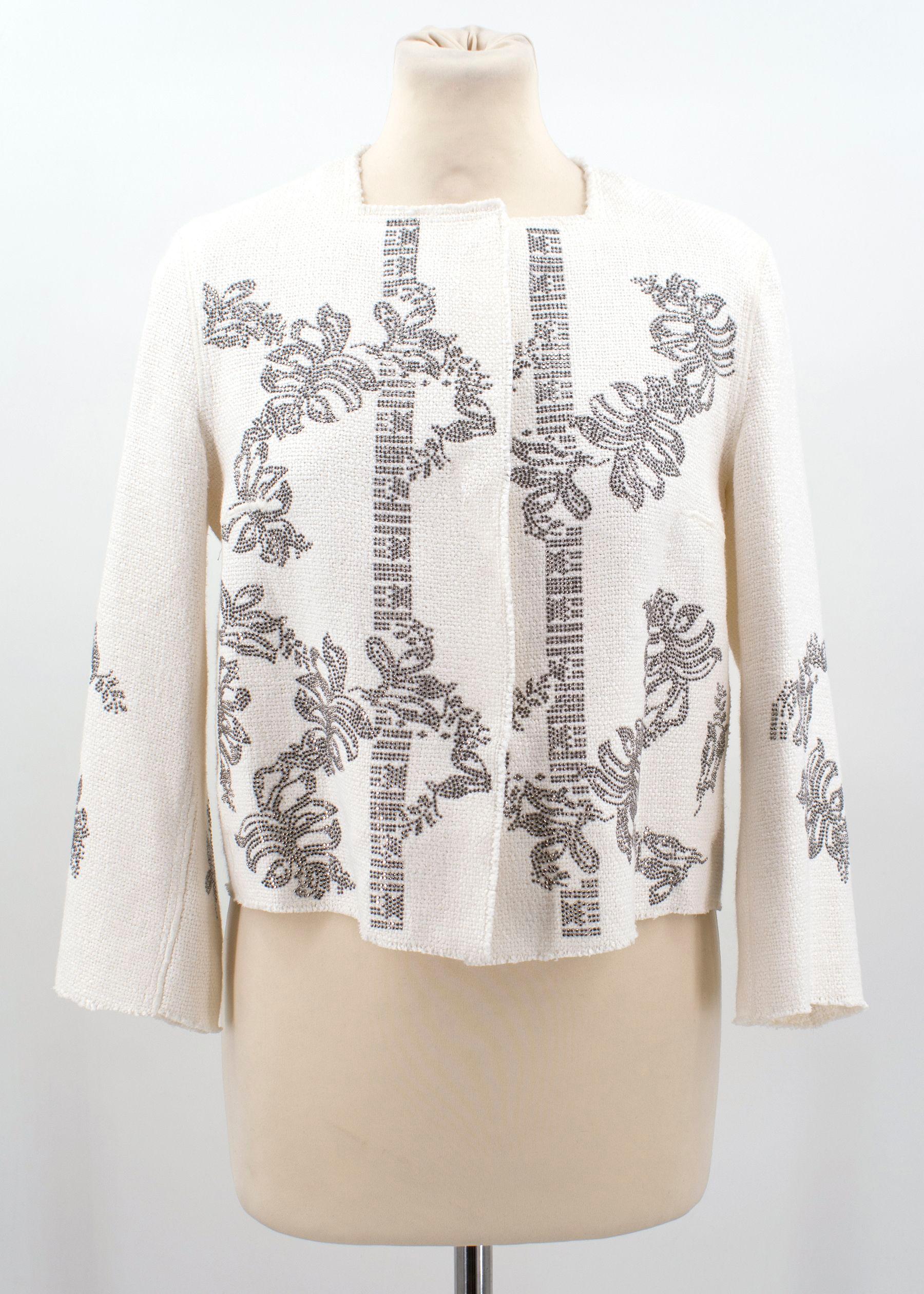 Condition:10/10, never worn with tags.
Cream collarless heavily embellished jacket -  front and back.

Measurements are taken laying flat, seam to seam. 

Shoulders: 38 cm 
Chest: 43 cm 
Length: 47 cm 
Sleeves: 47 cm 