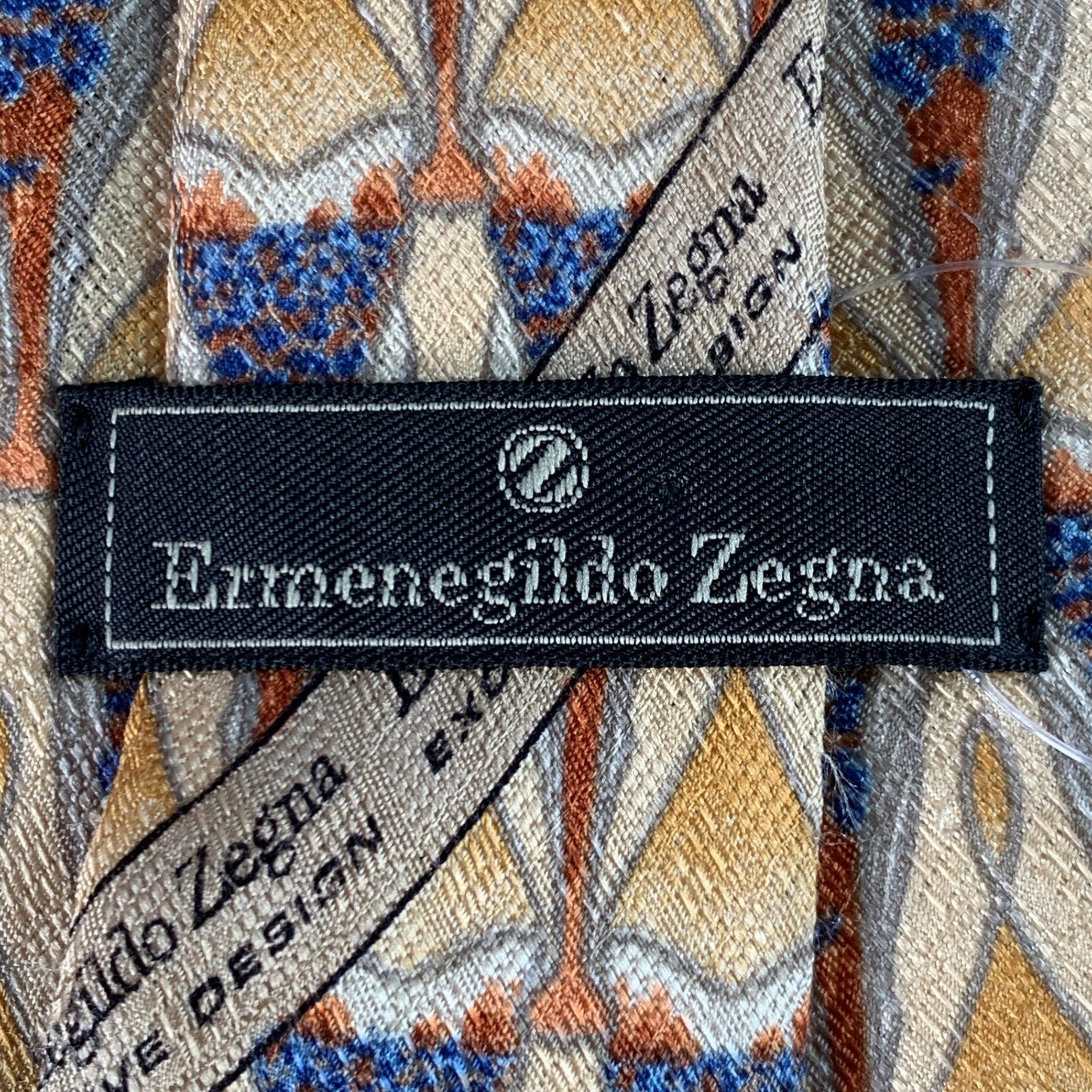 Uomo Cravatta in seta Ermenegildo Zegna Beige Blu Triangoli Astratti in vendita