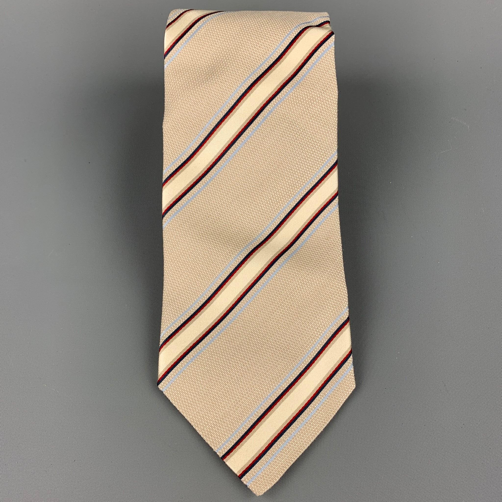 ERMENEGILDO ZEGNA tie comes in a beige & navy diagonal stripe silk. Made in Italy.Very Good Pre-Owned Condition.Width: 4 inches 
  
  
 
Reference: 107881
Category: Tie
More Details
    
Brand:  ERMENEGILDO ZEGNA
Color:  Beige
Color 2: 