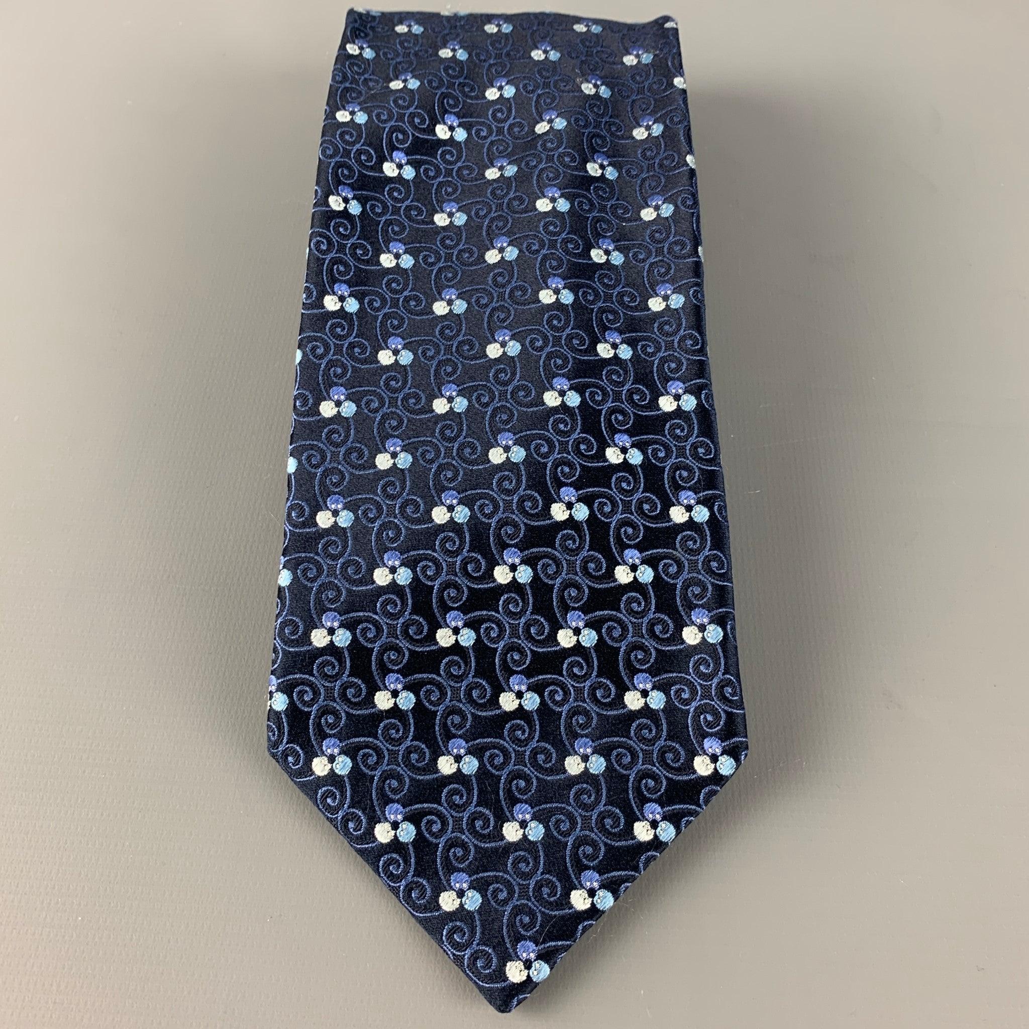 ERMENEGILDO ZEGNA tie in a black silk satin fabric featuring an all over blue swirl pattern. Made in Italy.Very Good Pre-Owned Condition. 

Measurements: 
  Width: 3.5 inches Length: 60 inches 
  
  
 
Reference: 126563
Category: Tie
More Details
  