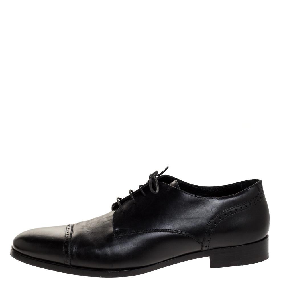 These designer oxfords from Ermenegildo Zegna are the epitome of elegance and poise. These trendy black oxfords are just what you need to make a unique style statement at the next event you attend. They have lace-ups, brogue detailing and leather