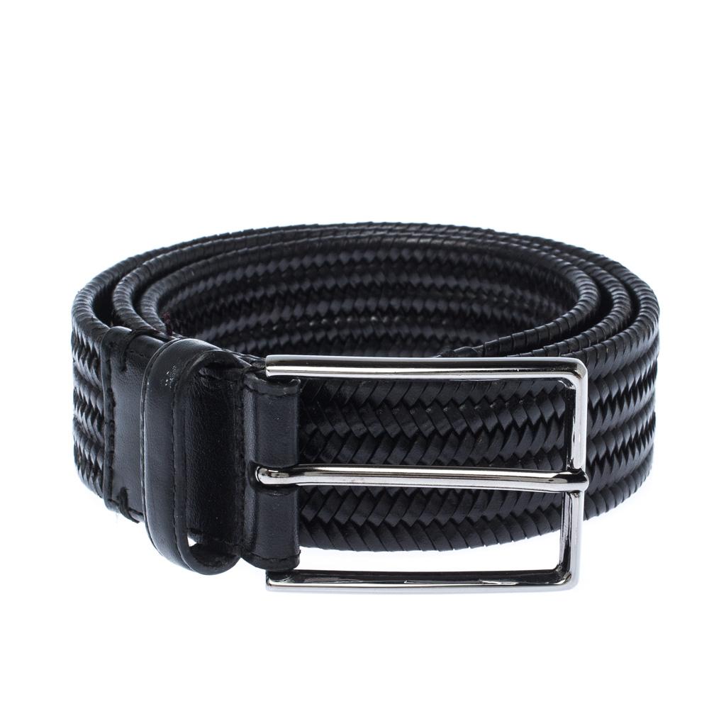 A staple accessory, add this Ermenegildo Zegna belt to your classic collection. This braided belt is crafted from leather in a classic black shade and is completed with a slender silver-tone buckle and a single loop.

Includes: The Luxury Closet