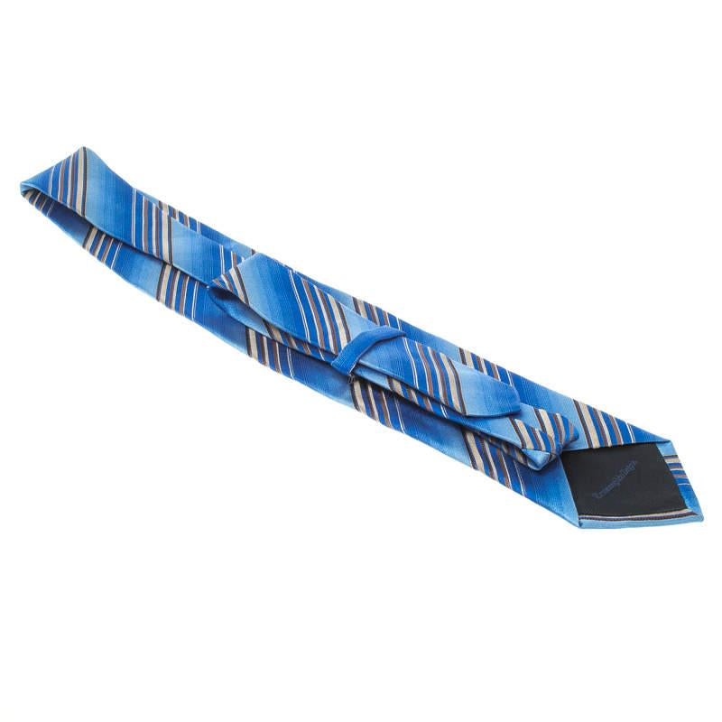 This blue tie from Ermenegildo Zegna is sure to make you look suave, smart and very handsome. The tie is made of 100% silk and features a lovely striped pattern all over it. Wear it for your formal meetings and you are sure to make a mark.

