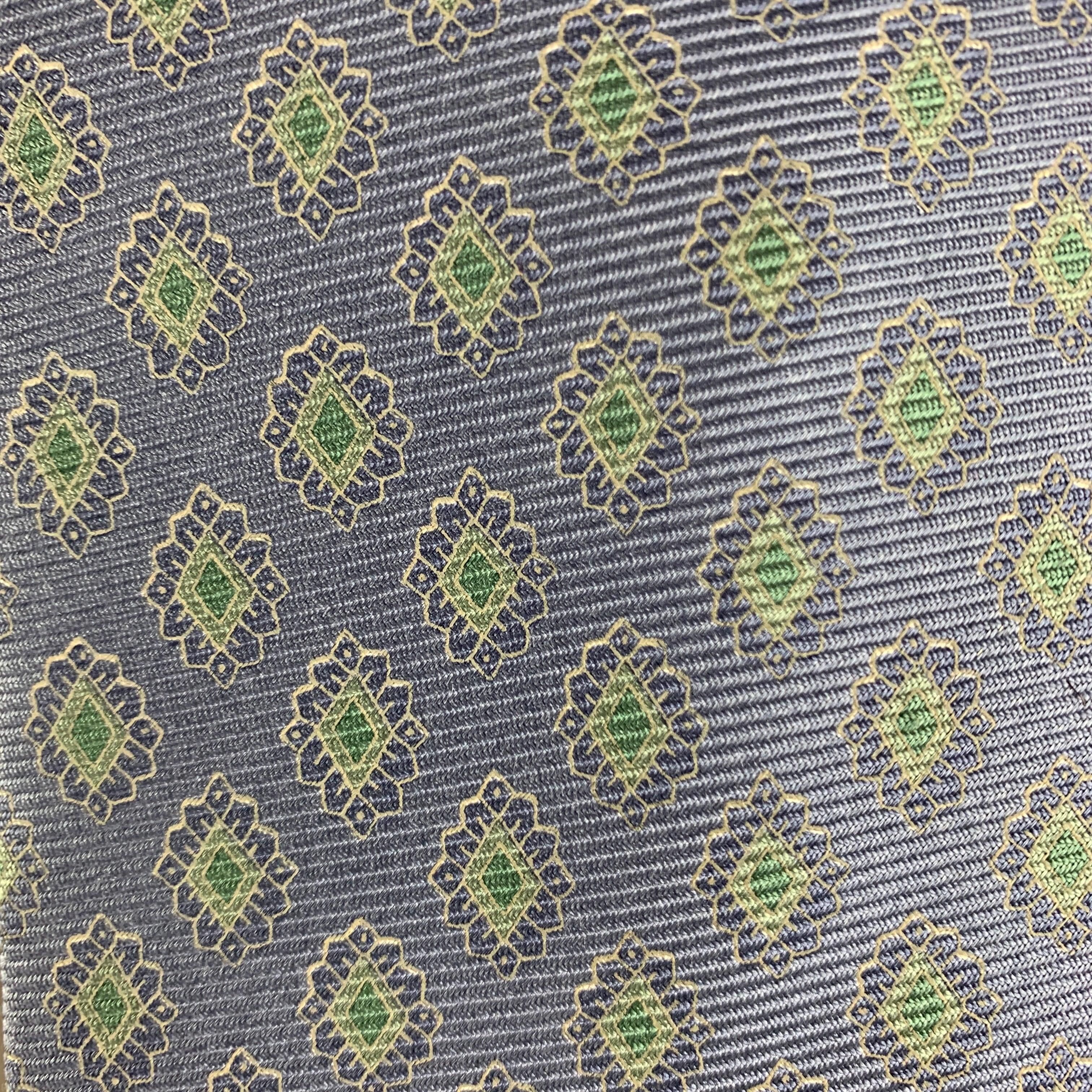 ERMENEGILDO ZEGNA necktie comes in blue featuring a green rhombus pattern. 100% silk. Made in Italy.
Very Good Pre-Owned Condition.
 

Measurements: 
  Width: 3 inches Length: 58 inches 




  
  
 
Reference: 124755
Category: Tie
More Details
   
