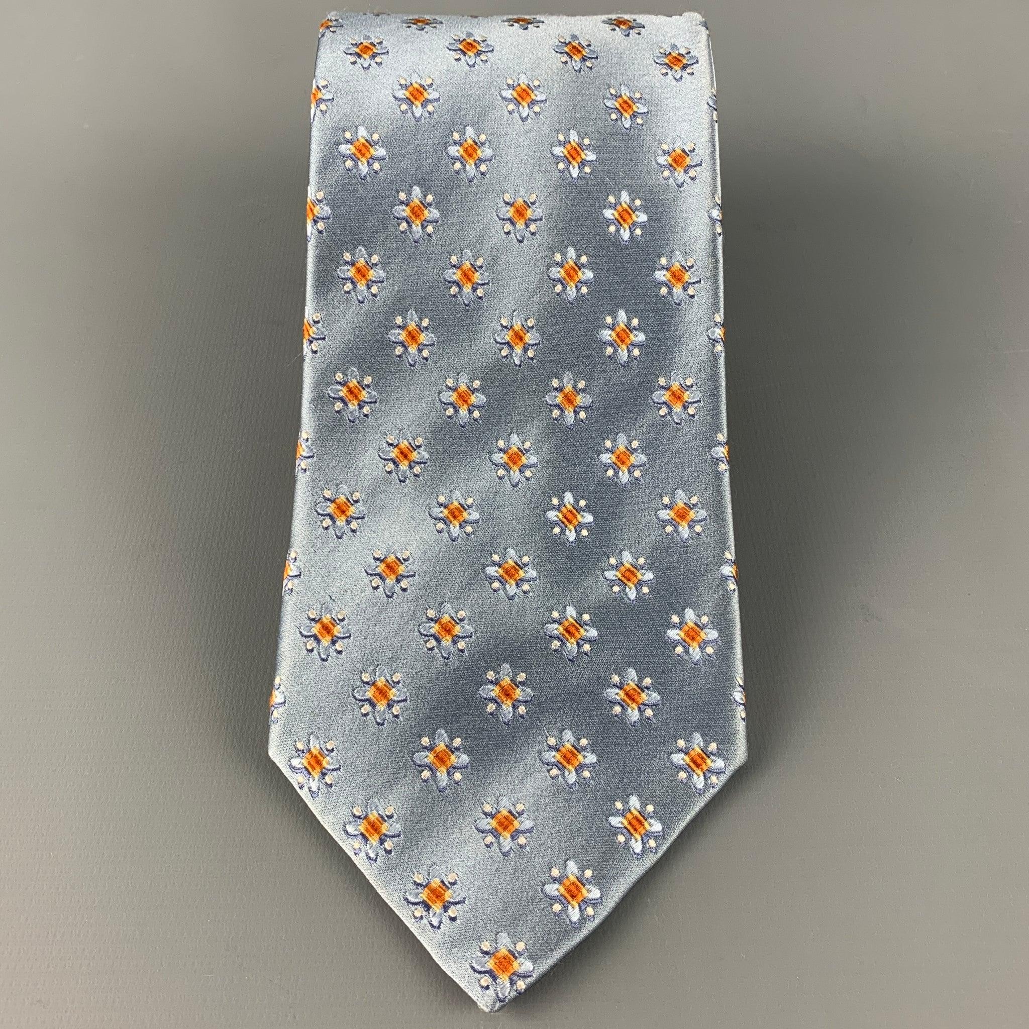 ERMENEGILDO ZEGNA
tie in a blue silk satin, featuring an orange abstract floral pattern. Made in Italy.Very Good Pre-Owned Condition. 

Measurements: 
  Width: 3. inches Length: 60 inches 
  
  
 
Reference: 126573
Category: Tie
More Details
   