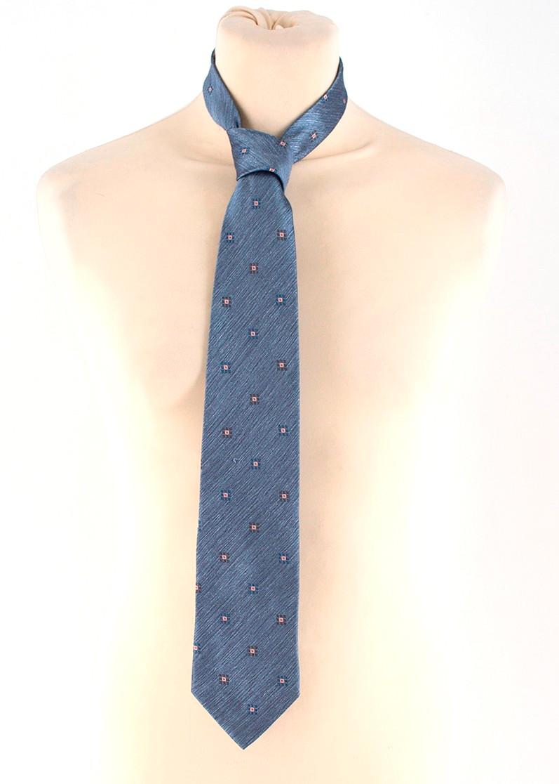 Ermenegildo Zegna Blue Silk Noil Tie
 
 - Blue printed tie
 - Silk noil
 
 Please note, these items are pre-owned and may show some signs of storage, even when unworn and unused. This is reflected within the significantly reduced price. Please refer