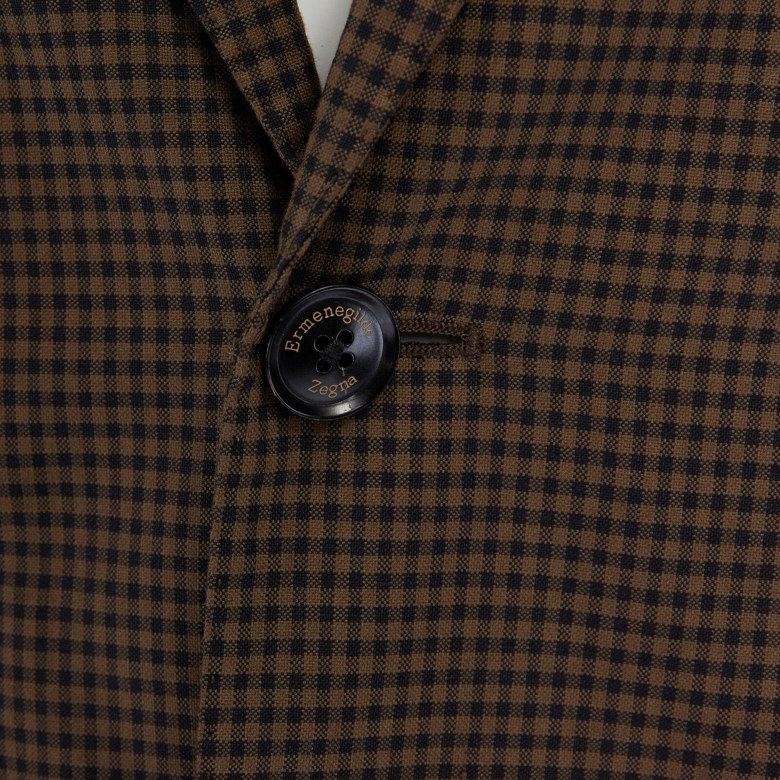 ERMENEGILDO ZEGNA brown black checked cotton wool blend blazer jacket EU50 US40
Brand: ERMENGEGILDO ZEGNA
Material: Cotton, wool, silk blend. 
Color: Brown and black
Extra Details: Notched collar. 3 pocket front. Dual button front closure. Long