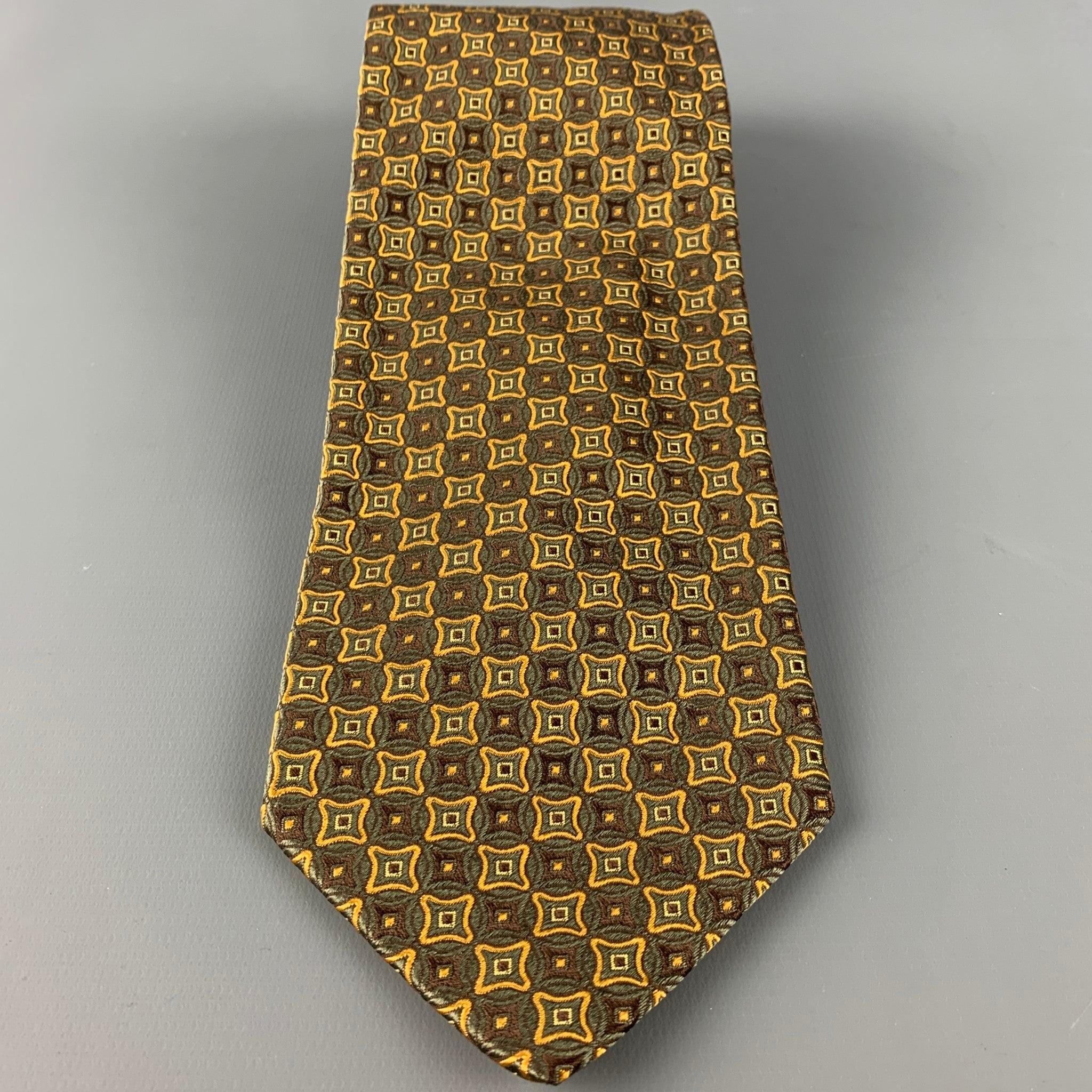 ERMENEGILDO ZEGNA tie in a brown silk with a all over gold squares pattern. Made in Italy.Very Good Pre-Owned Condition. 

Measurements: 
  Width: 3.5 inches Length: 60 inches 
  
  
 
Reference: 126565
Category: Tie
More Details
    
Brand: 