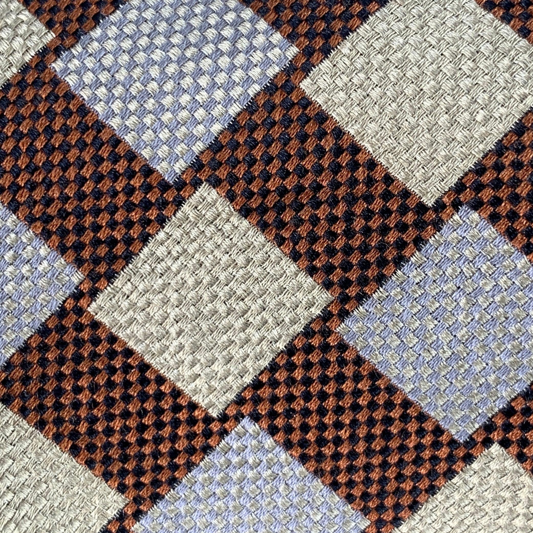 ERMENEGILDO ZEGNA
necktie in a brown and grey silk featuring a squares pattern. Made in Italy.Excellent Pre-Owned Condition. 

Measurements: 
  Width: 3.75 inches Length: 57.5 inches 
  
  
 
Sui Generis Reference: 134614
Category: Tie
More Details
