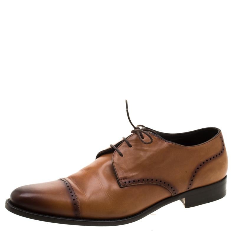 Take each step with style in these derby oxfords from Ermenegildo Zegna. Crafted from leather, they carry a modern design with a smart brown exterior that flaunts neat stitch detailing and lace-up fronts. The leather-lined insoles provide comfort