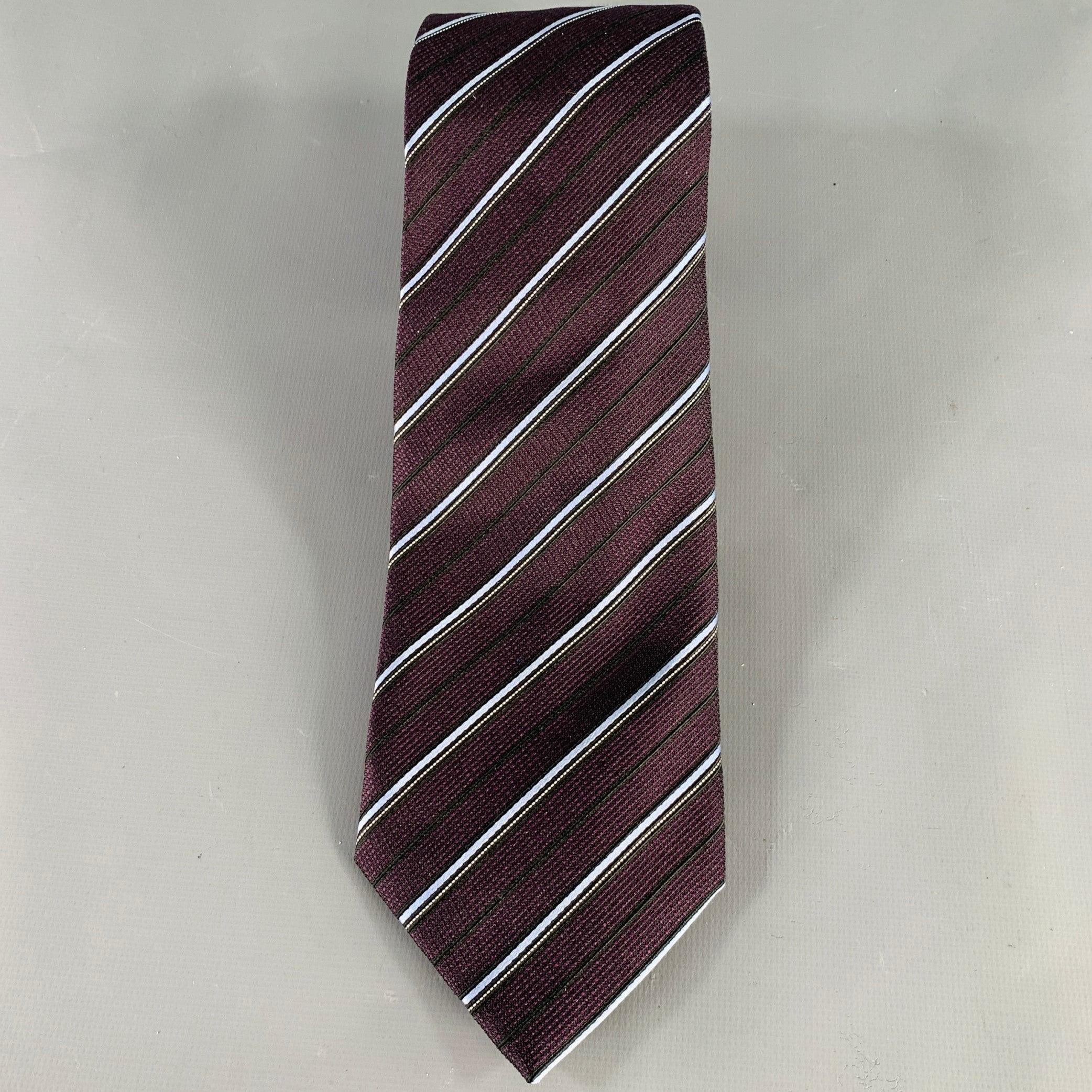 ERMENEGILDO ZEGNA necktie in a brown and light blue silk jacquard featuring a diagonal stripe pattern. Made in Italy.Excellent Pre-Owned Condition. 

Measurements: 
  Width: 3.5 inches Length: 58 inches 

  
  
 
Sui Generis Reference:
