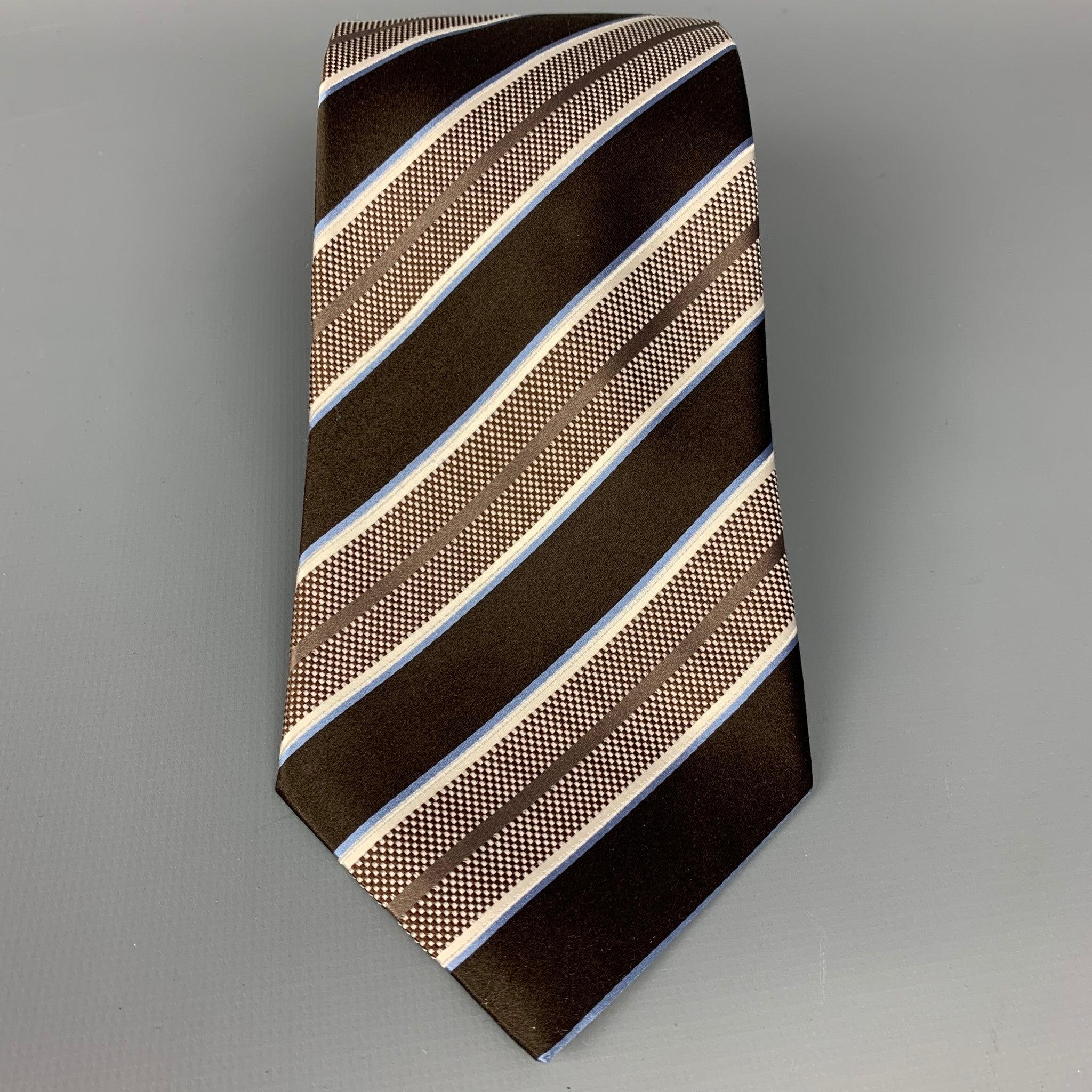 ERMENEGILDO ZEGNA neck tie comes in a brown & white stripe silk. Made in Italy.Very Good Pre-Owned Condition. Measurements.Width: 3.5 inches 
  
  
 
Reference: 108399
Category: Tie
More Details
    
Brand:  ERMENEGILDO ZEGNA
Color:  Brown
Color 2: 