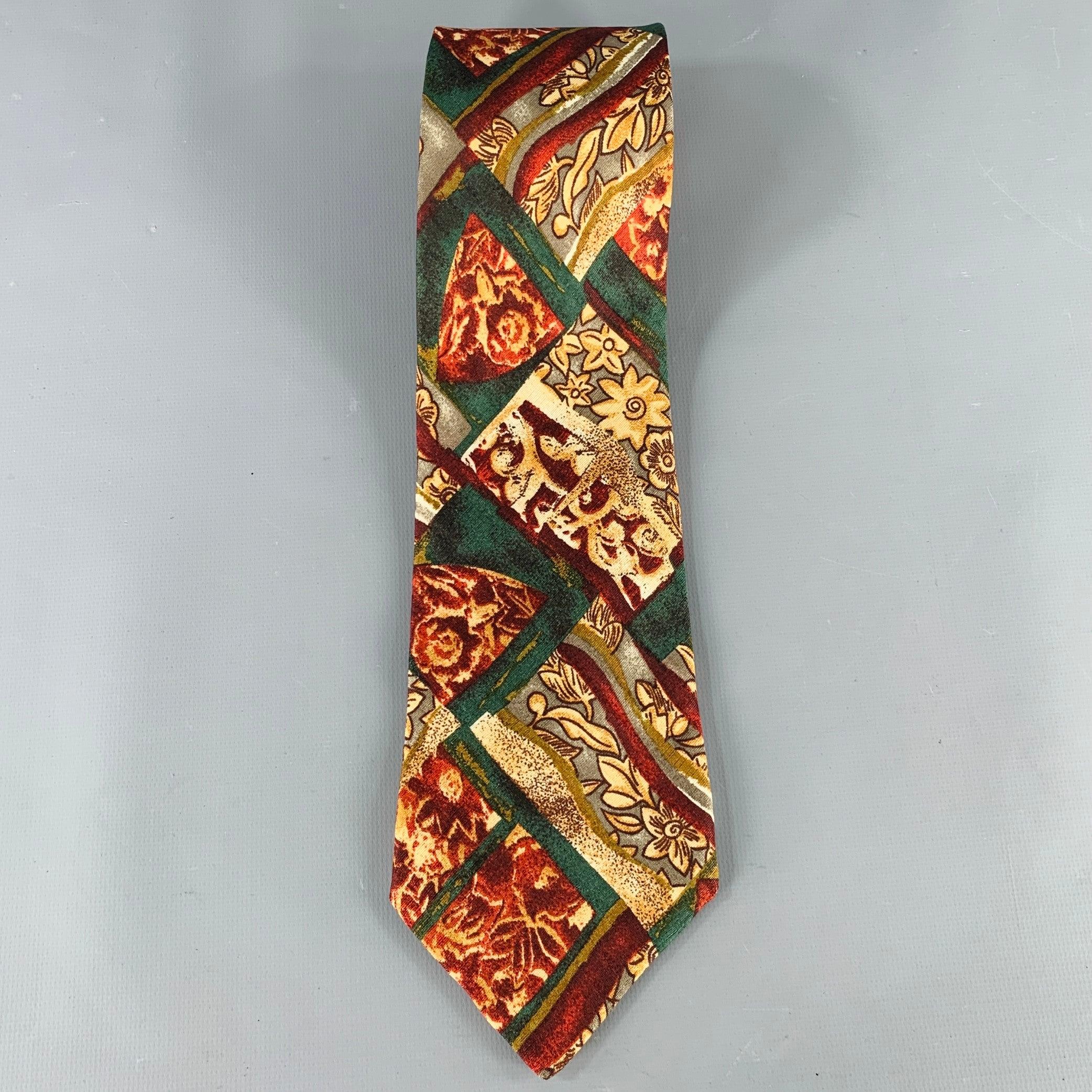 ERMENEGILDO ZEGNA necktie
in a burgundy and green silk featuring an abstract leaves and flowers print. Made in Italy.Very Good Pre-Owned Condition. 

Measurements: 
  Width: 3.75 inches Length: 58 inches 
  
  
 
Sui Generis Reference: