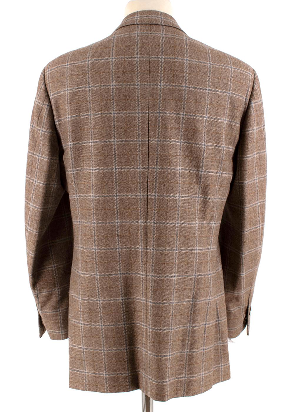 Ermenegildo Zegna Checkered Cashmere Blazer

-Luxurious soft texture
-Classic cut
-Checkered pattern 
-Partially lined 
-3 functional outer pockets 
-2 functional inner pockets 
-1 interior pen pocked 

Materials:

Main: 100 % Cashmere 
Lining: 100%