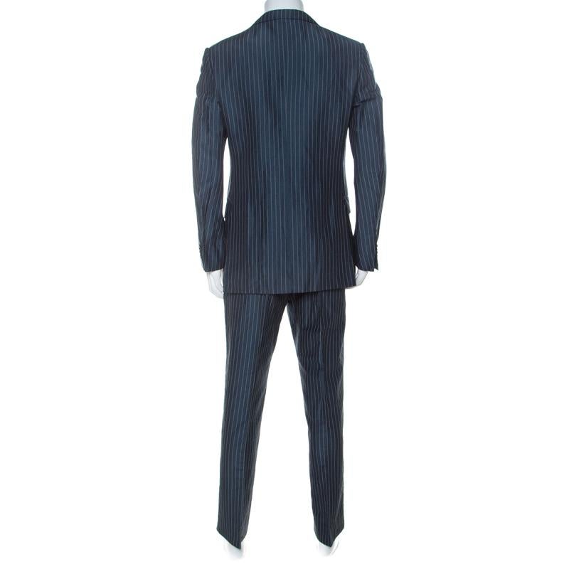 Walk into any formal gathering with style in this suit from Ermenegildo Zegna Couture. It comes tailored from a blend of linen and silk, and designed with stripes. The blazer comes with two front buttons and peak lapels, and the matching pants come