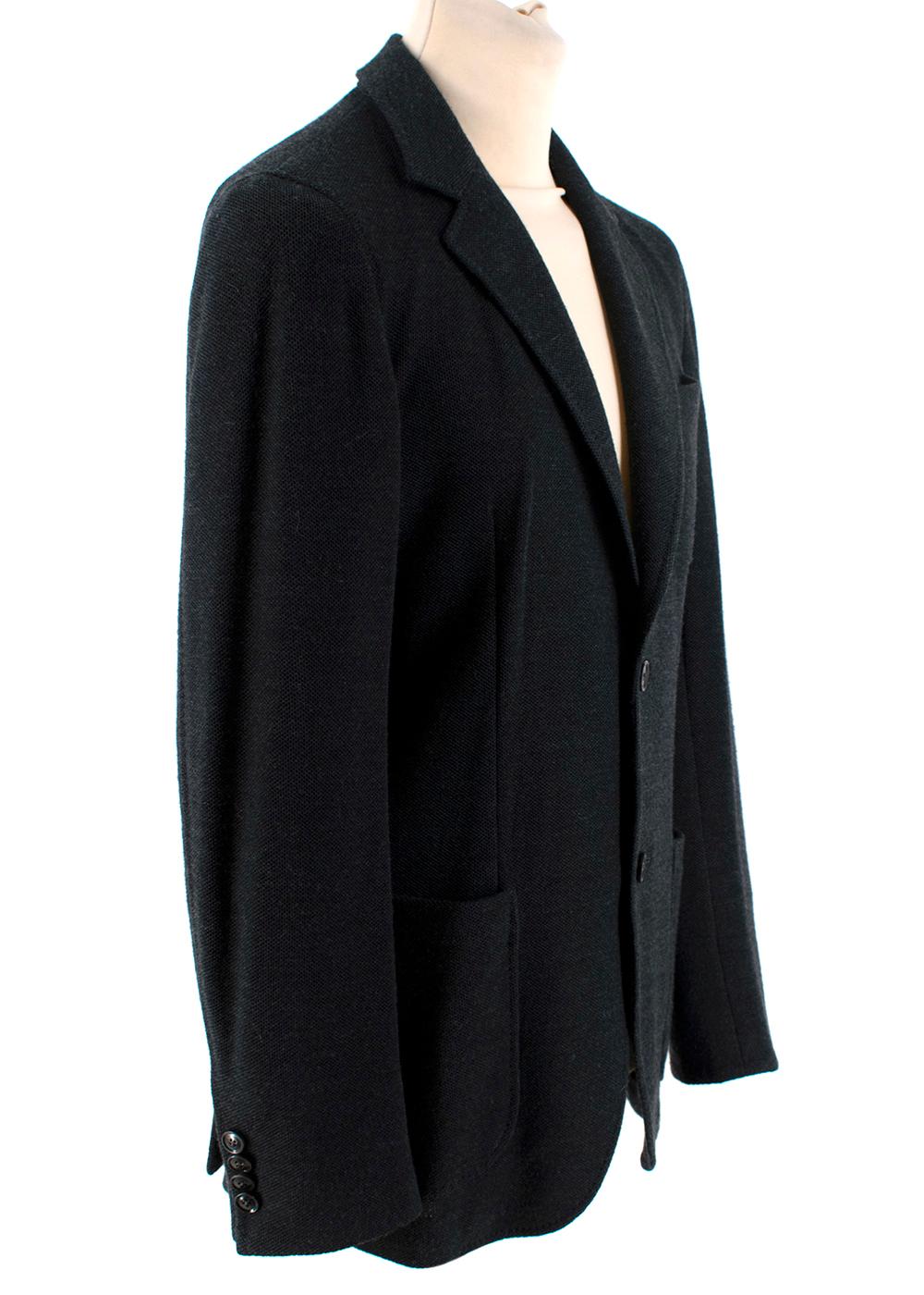 Ermenegildo Zegna Dark Grey Wool Single Breasted Jacket

- Notch lapels
- Chest welt and two front patch pockets with a smaller zipped pocket
- Single vent
- Internal pocket
- Tonal elbow patches
- Not lined

Materials:
100% Virgin Wool

Made in