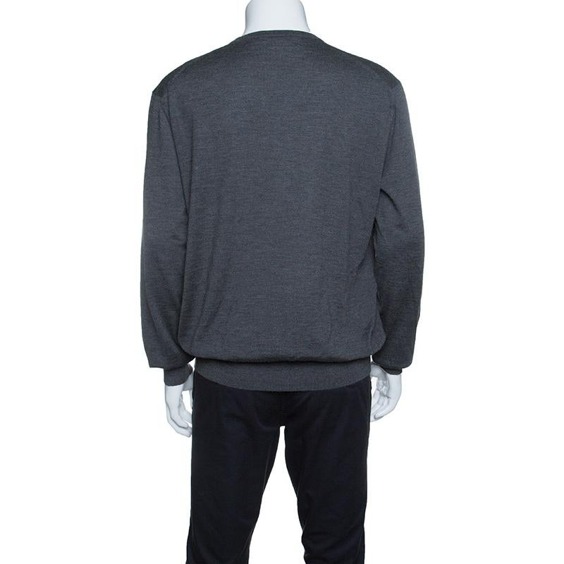 You'll love to wear this Ermenegildo Zegna sweater whenever you step out on a chilly day as it delights in a grey shade. The fabulous sweater is made of cashmere and silk and features a simple design of long sleeves and a v neck.

Includes: The