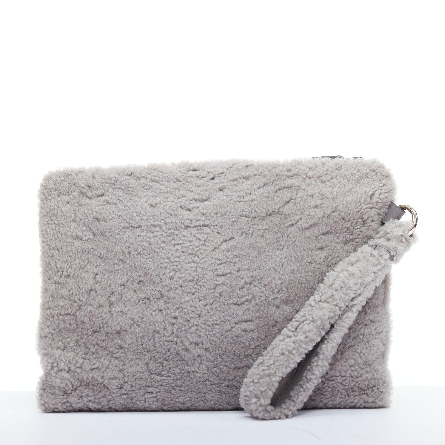 ERMENEGILDO ZEGNA grey lambskin shearling wrist strap zip clutch bag In Excellent Condition For Sale In Hong Kong, NT