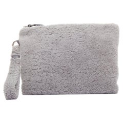 Bolso de mano con cremallera y correa para la muñeca de piel de cordero gris de Ermenegildo Zegna