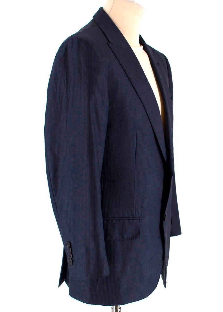 Ermenegildo Zegna silk and wool-blend navy suit jacket 

- Navy shadow striped, silk and wool-blend 
- Peak lapels, long sleeves, padded shoulders
- Decorative buttons on cuffs
- Single chest welt pockets, flapped pockets
- Dual vent
- Single