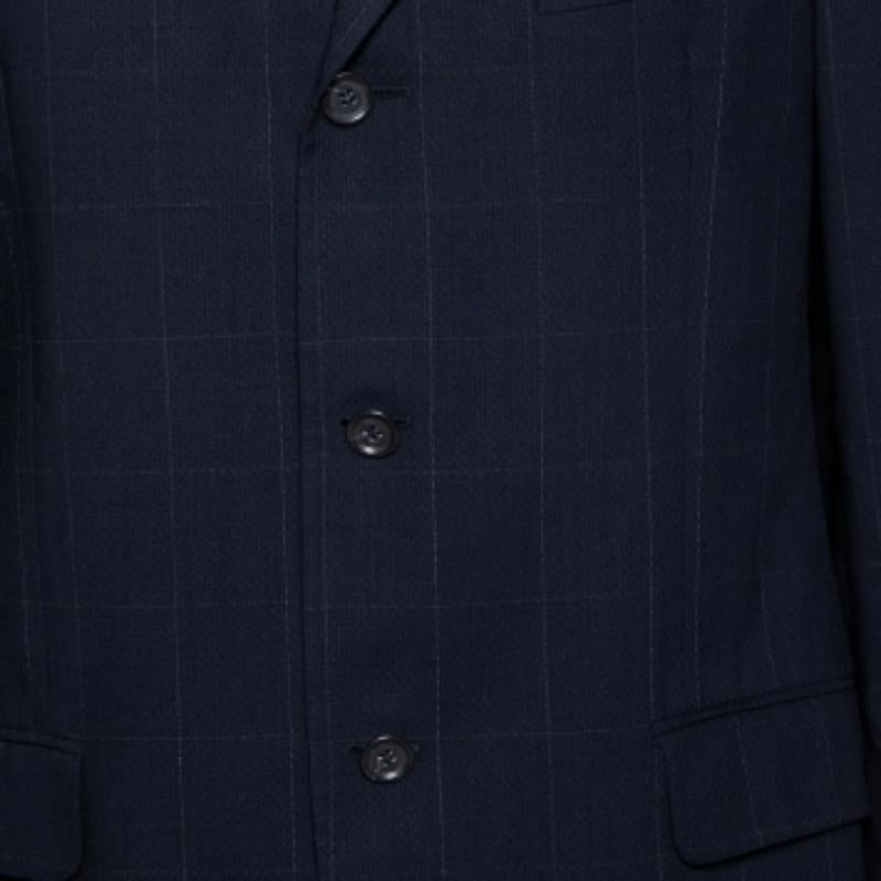 Añade a tu armario este elegante blazer a cuadros de Ermenegildo Zegna, confeccionado en lana. Con un color azul marino y bolsillos, es de un solo pecho y perfecto tanto para eventos diurnos como nocturnos.