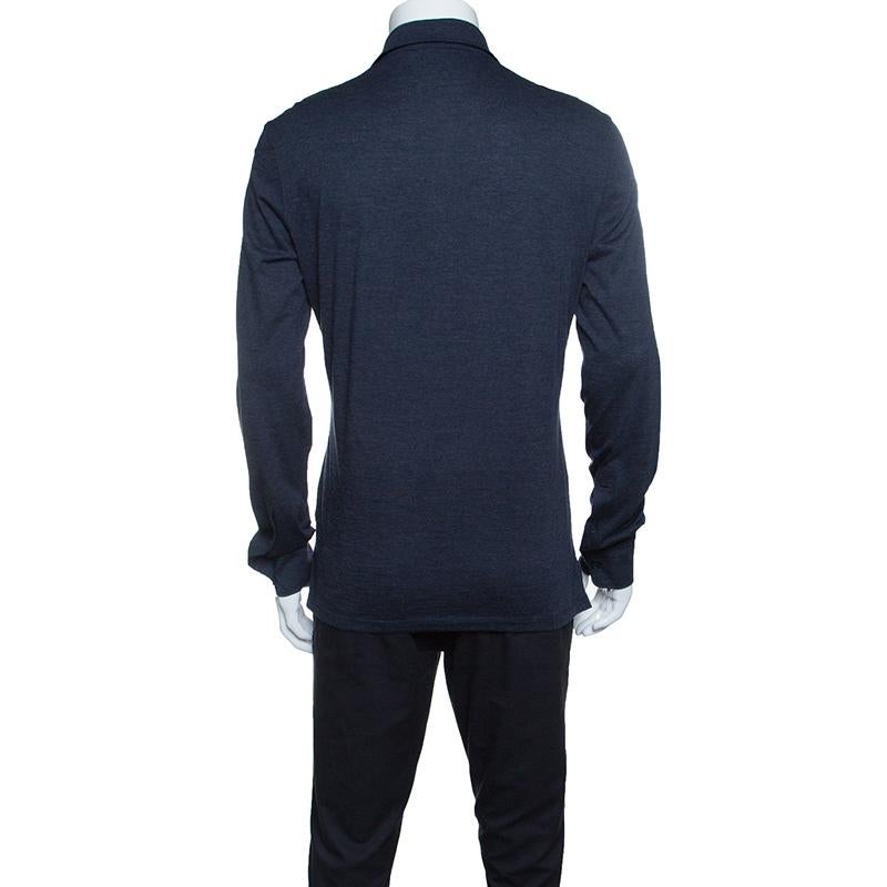 This polo T-shirt from Ermenegildo Zegna features a well-fitted, body-hugging silhouette and comes with long sleeves. It has the classic polo neckline and features a navy blue hue. Knitted in a blend of wool and cotton, we think it will look best