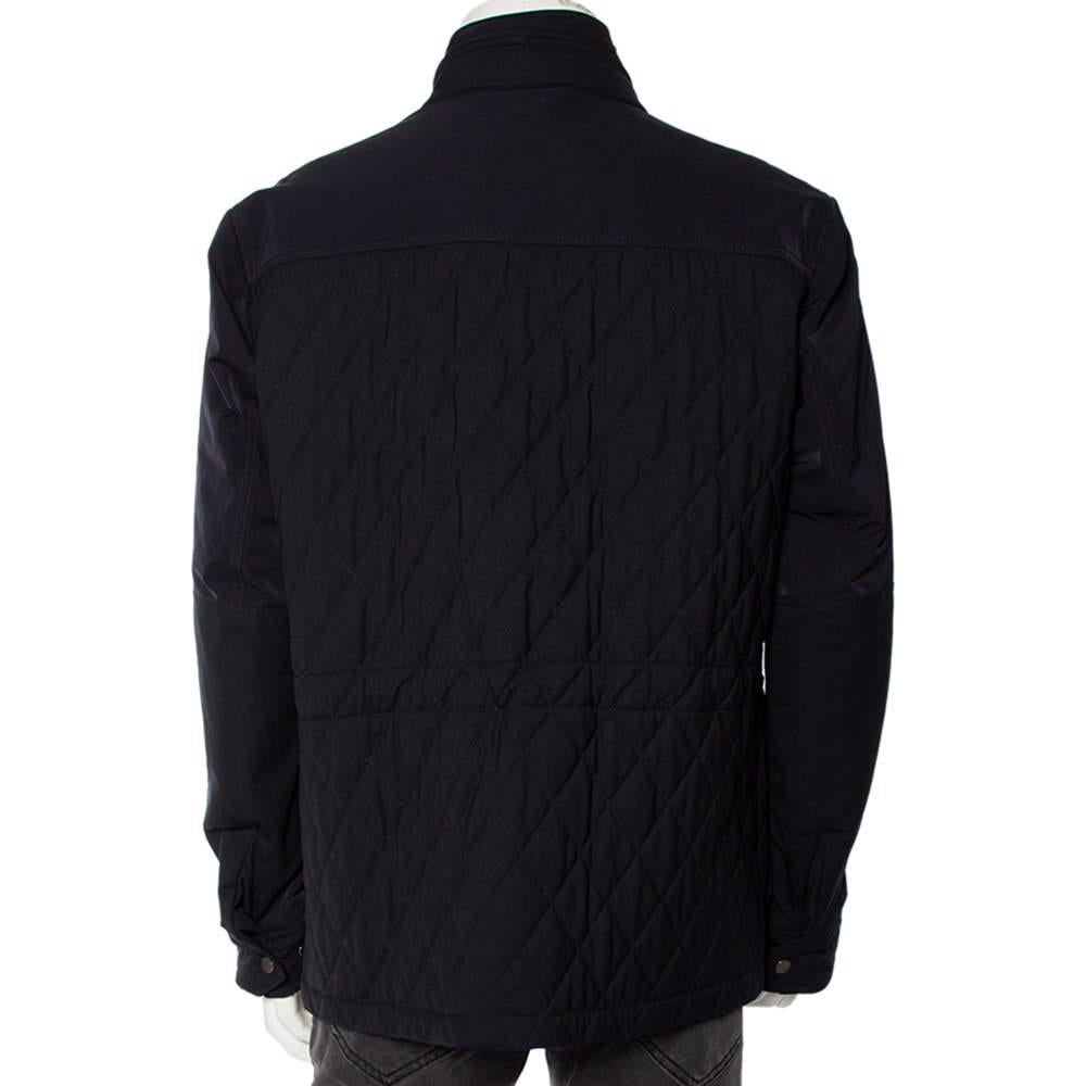 Complete a luxe look by wearing this charming jacket from Ermenegildo Zegna. Designed to be a reliable style companion, the men's designer jacket is detailed with quilting, zip closure, and two pockets.

Includes: Tag, Brand tag
