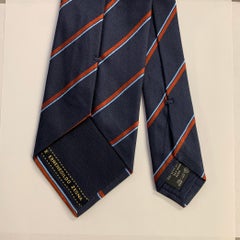 ERMENEGILDO ZEGNA Corbata de seda a rayas diagonales óxido azul marino