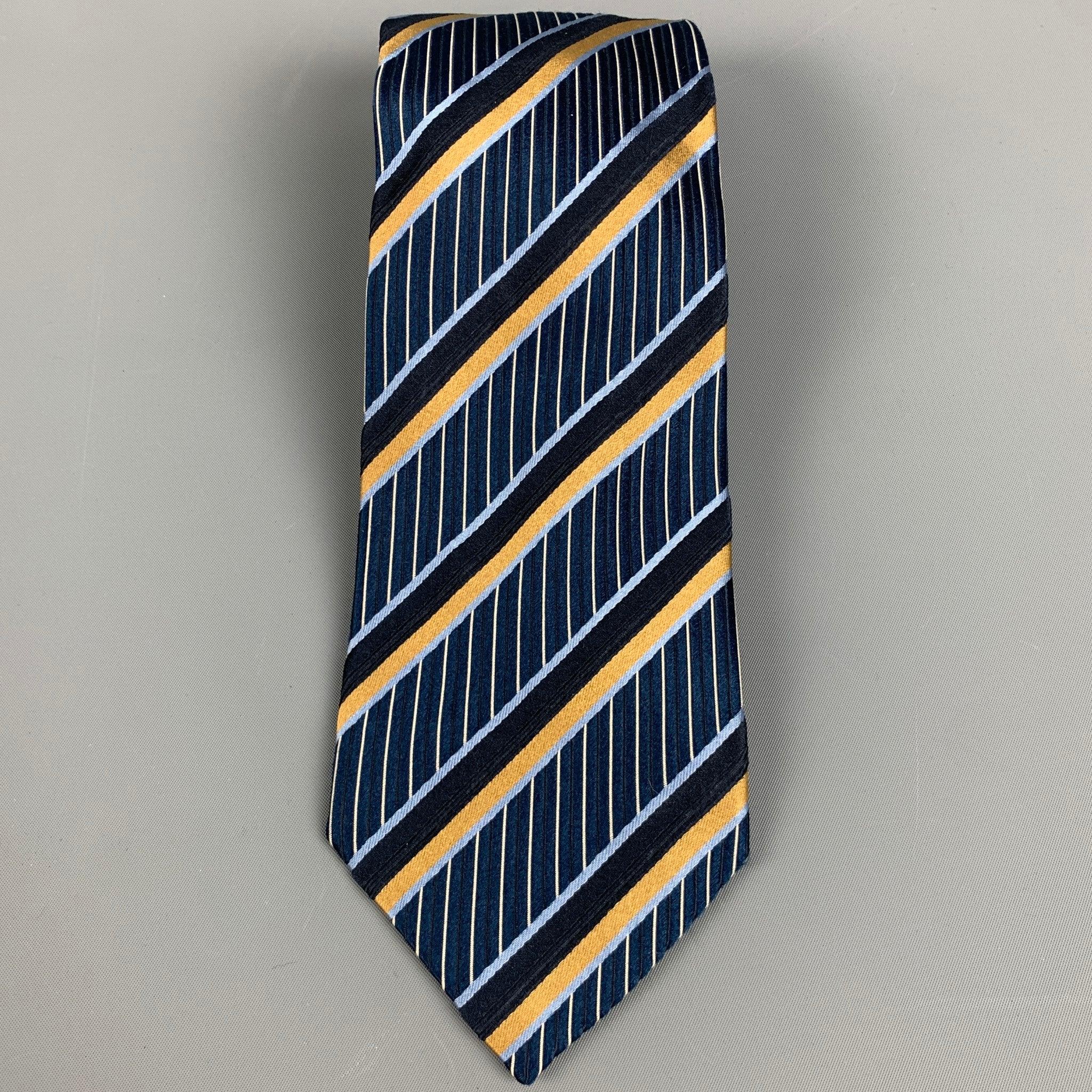 ERMENEGILDO ZEGNA
necktie in a jacquard navy silk fabric featuring yellow stripe pattern. Made in Italy.Excellent Pre-Owned Condition. 

Measurements: 
  Width: 3.5 inches Length: 60 inches 
  
  
Reference: 128079
Category: Tie
More Details
   