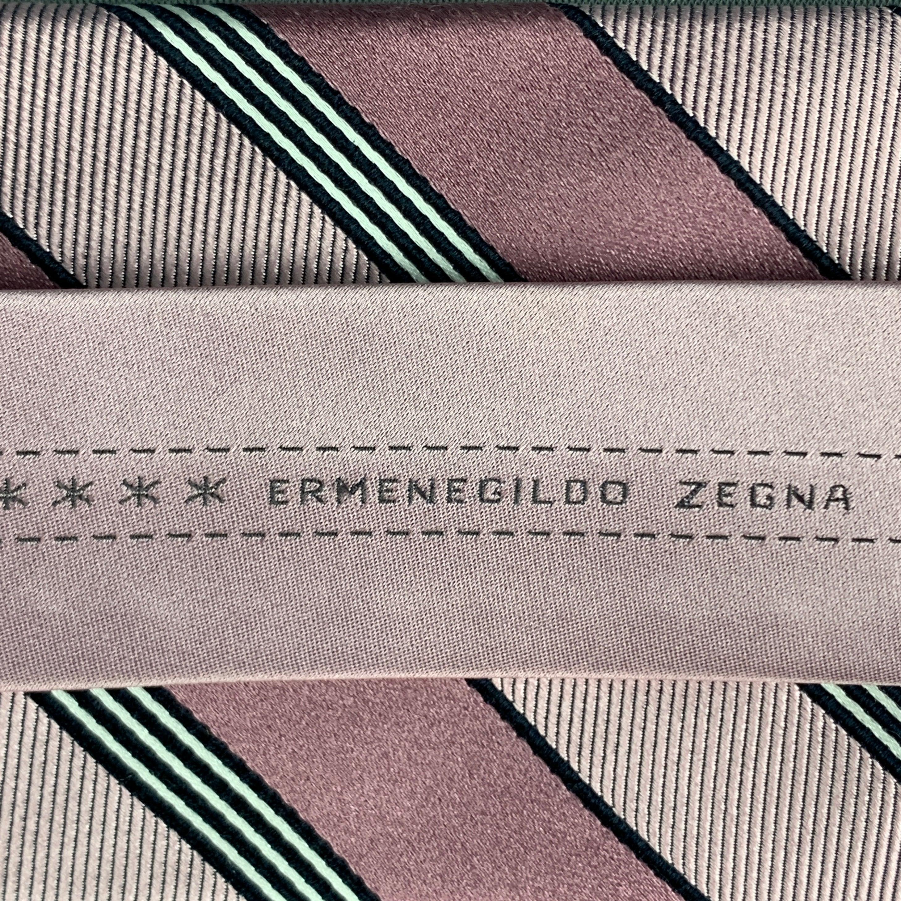ERMENEGILDO ZEGNA vintage necktie comes pink featuring black diagonal stripes. 100% silk. Made in Italy.
Very Good Pre-Owned Condition
 

Measurements: 
  Width: 3 inches Length: 60 inches 


  
  
 
Reference: 124758
Category: Tie
More Details
   