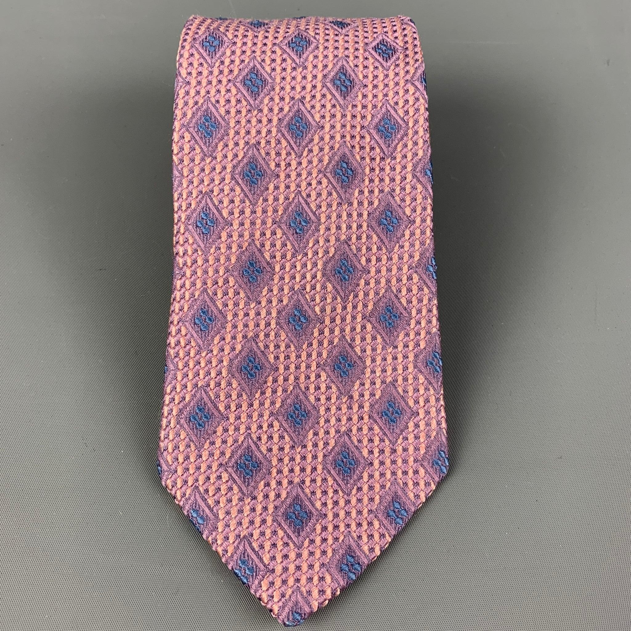 ERMENEGILDO ZEGNA necktie comes in a silk and cotton blend featuring a diamond pattern of purple and blue. Made in Italy.
Good Pre-Owned Condition. 

Measurements: 
  Width: 3.5 inches Length: 58 inches 
  
  
 
Reference: 124775
Category: Tie
More