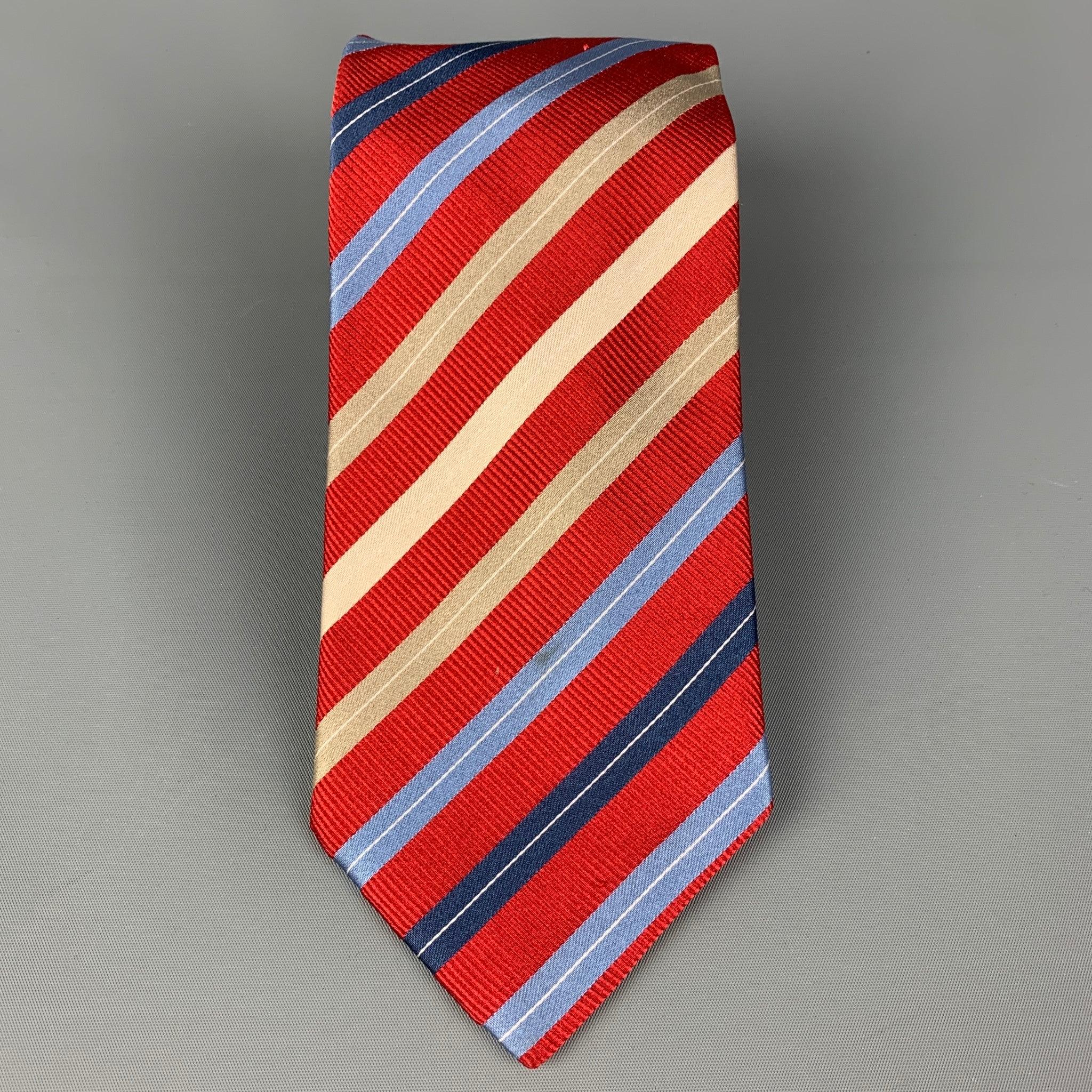 ERMENEGILDO ZEGNA necktie comes in a red & blue silk with a all over diagonal stripe print. Made in Italy.
 Very Good
 Pre-Owned Condition.Width: 3.5 inches 
  
  
  
 Sui Generis Reference: 117129
 Category: Tie
 More Details
  
 Brand: ERMENEGILDO