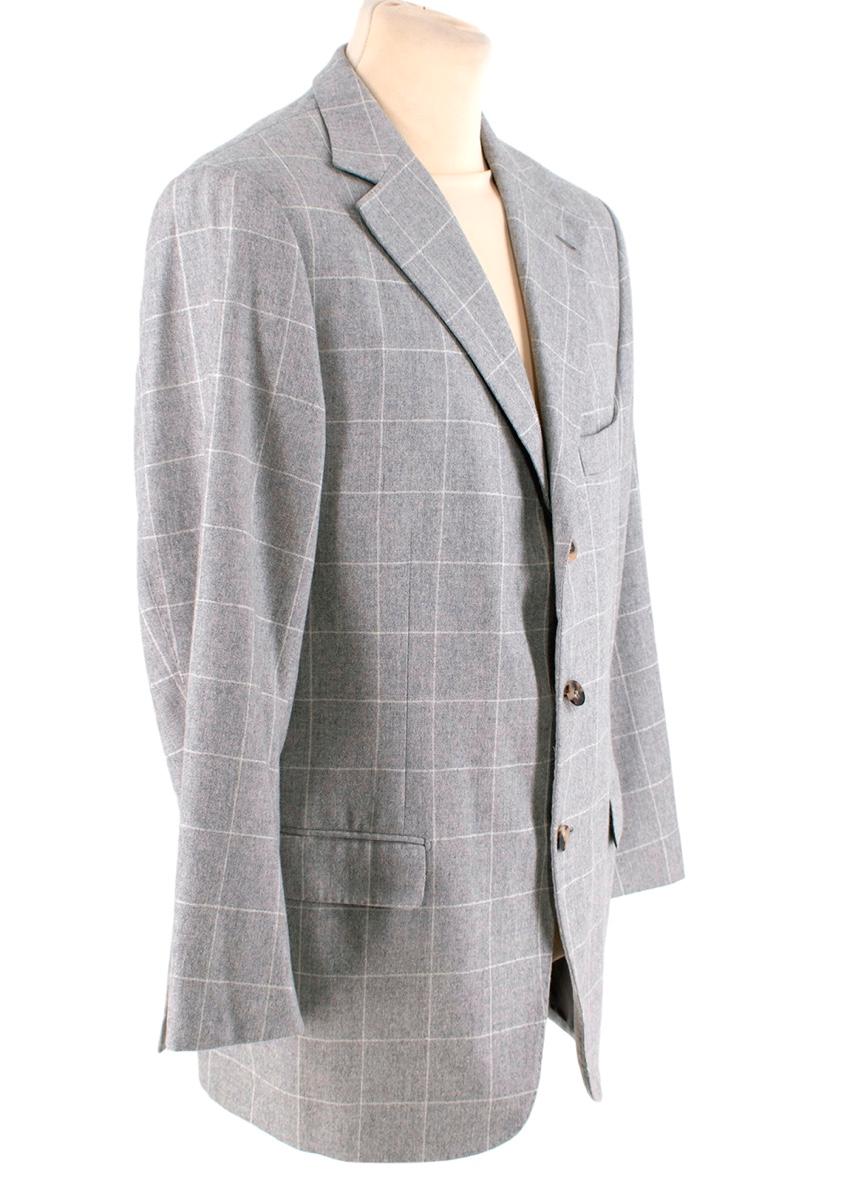 Ermenegildo Zegna Single Breasted Cashmere Blazer 
 

 -This cashmere chequered blazer from Ermenegildo Zegna is a tasteful Italian piece.
 -This single-breasted blazer boasts a plaid pattern that will add a subtle flair to your formalwear.

